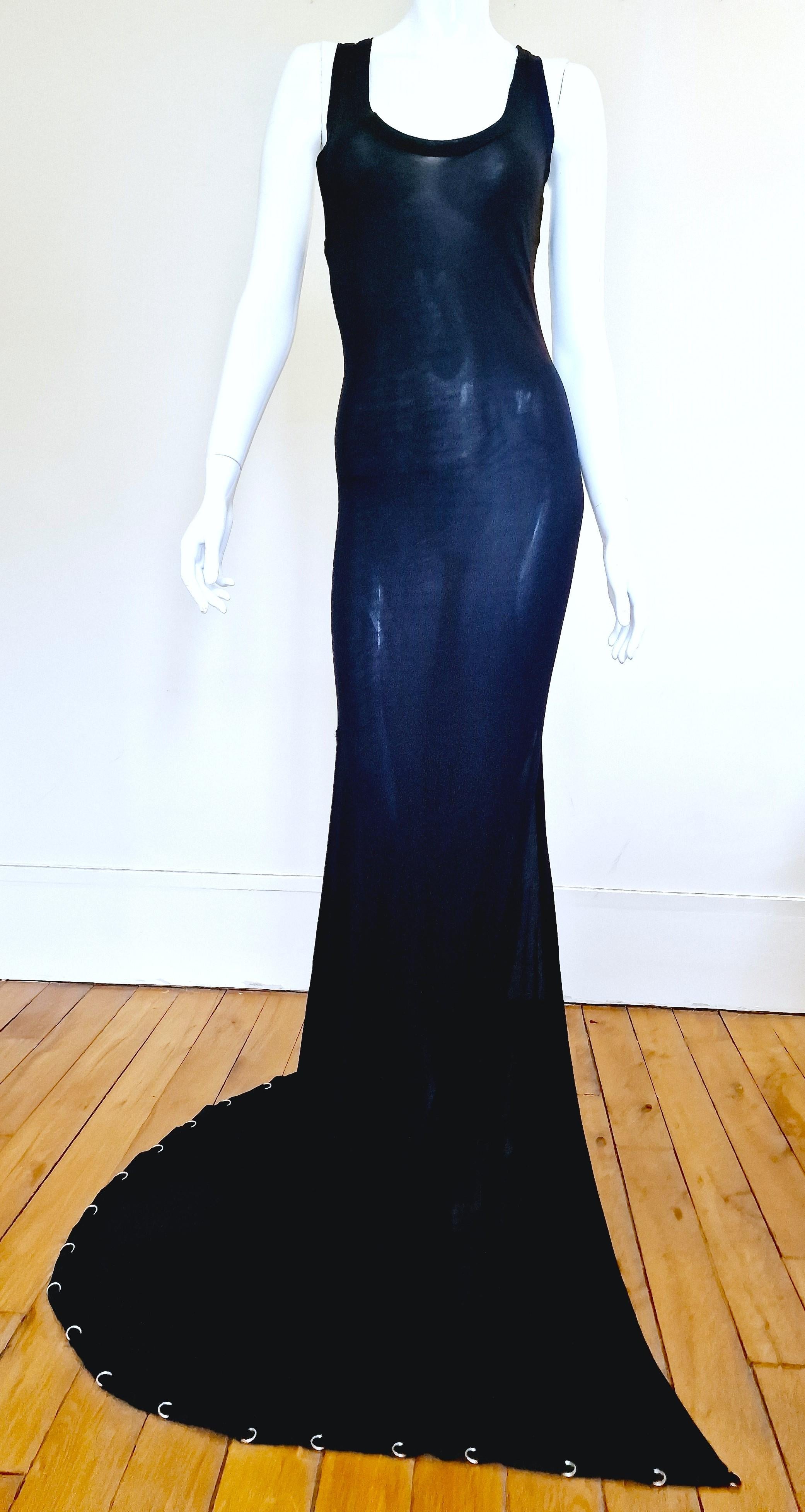 Gown by Jean Paul Gaultier!
You can adjust it with the metal ring at your waist or just hold it in your hand.
With 21 metal rings.

EXCELLENT condition!

SIZE
Fits from bigger medium to large.
Marked size: IT44 / D40 / FR40 / GB12 / USA10.
Very