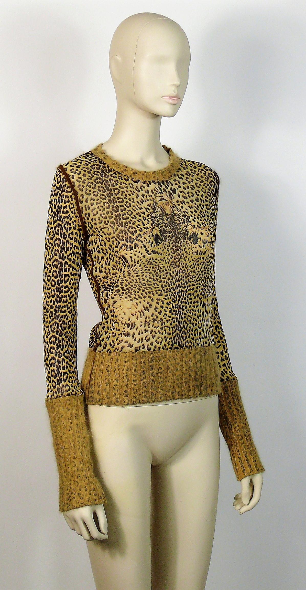 JEAN PAUL GAULTIER Fuzzi sheer mesh long sleeve top with cheetah print featuring gorgeous angora wool collar, cuffs and bottom.

Label reads JEAN PAUL GAULTIER Maille Femme Made in Italy.

Size tag reads : L.

Composition tag reads : 100%
