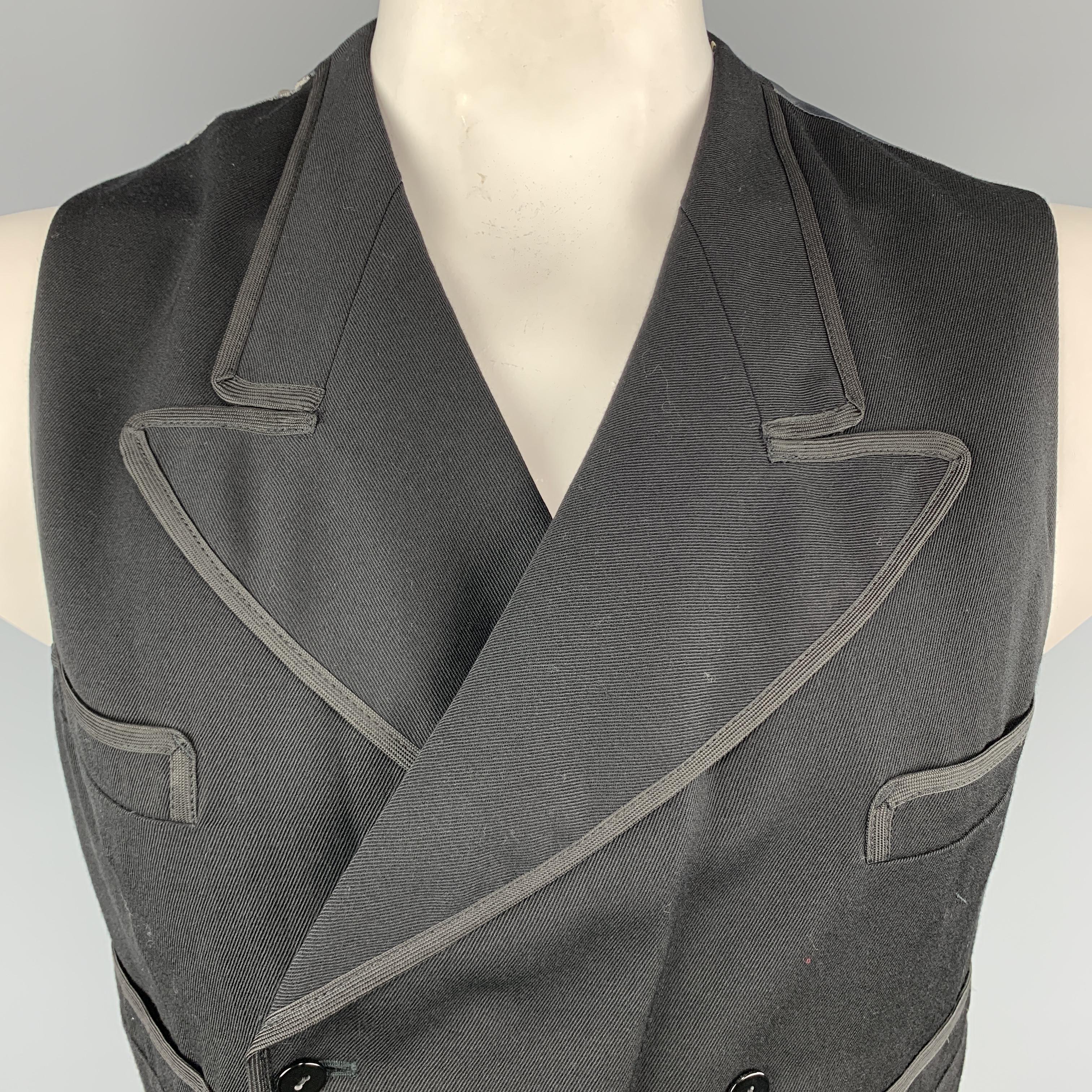 JEAN PAUL GAULTIER Vest comes in black and charcoal tones in a solid wool material, with a peak lapel, a trim, slit pockets, double breasted, and a 