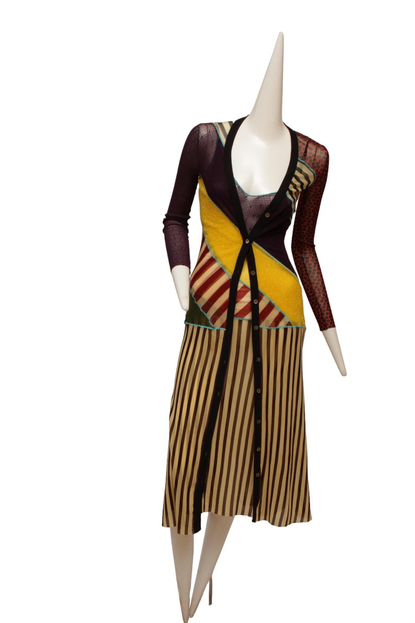 Jean Paul Gaultier Classique Maille Pattern Blocked Long Cardigan with buttons. This colorful iconic JPG mesh cardigan is pattern blocked with stripes, purple, metallic yellow gold, red polk dots and stripes. Mother of Pearl buttons.As styled on