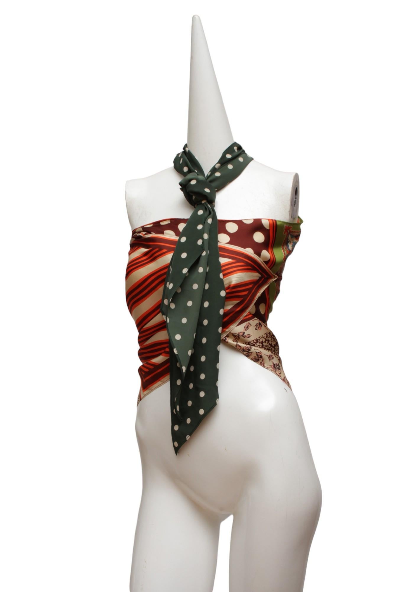 JEAN PAUL GAULTIER, Classique, Patchwork silk pants and silk scarf-like triangular top.

Pants have a side zipper and open flare hem.

Top has a large bow neck tie and triangular with ties on two points.

Pants Size US 4 or FR 34

Top Size US 6 or