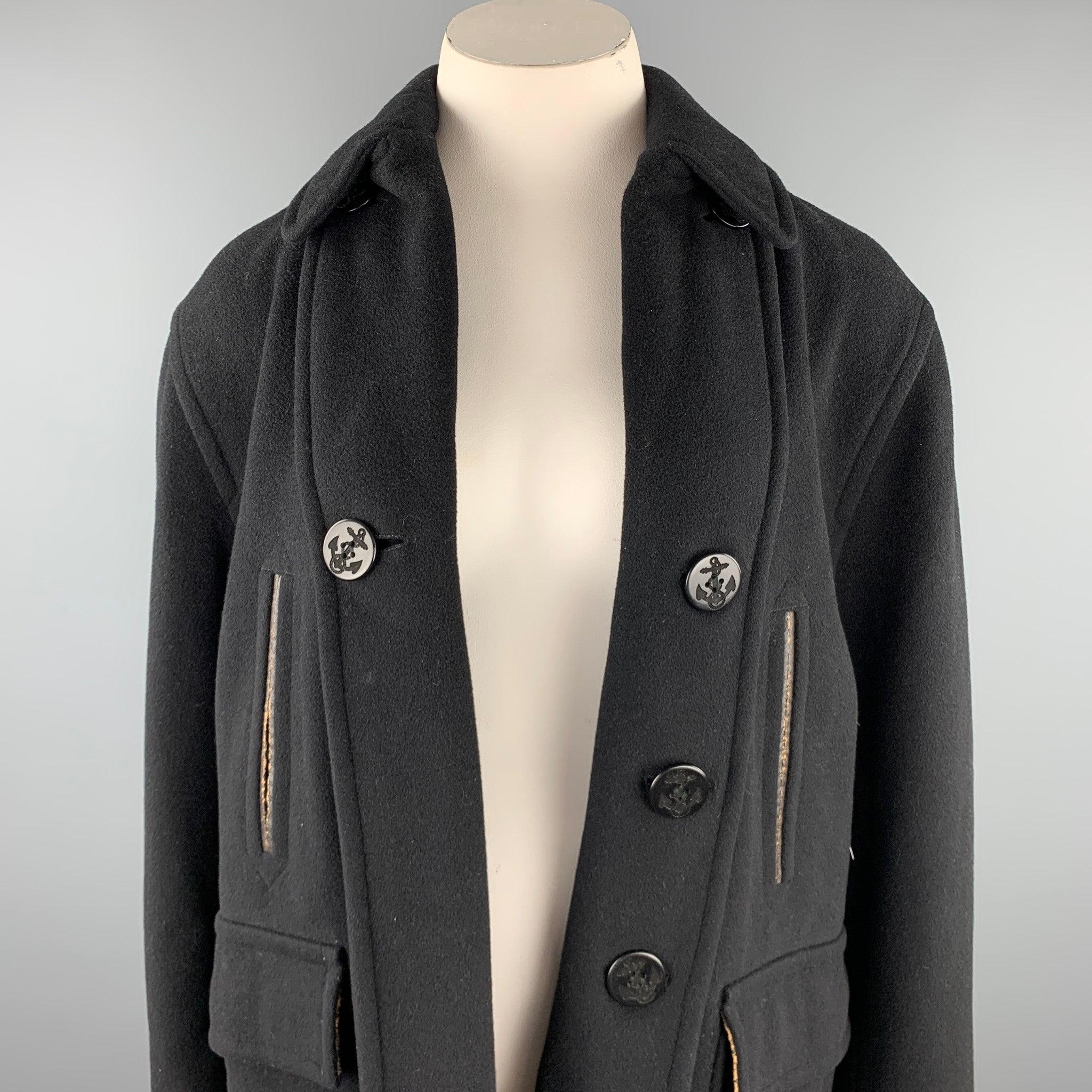 JEAN PAUL GAULTIER CLASSIQUE coat comes in a black wool blend with a full monogram print liner featuring a leather trim, patch pockets, button details, and a open front. Made in Italy.Good
Pre-Owned Condition. 

Marked:  I 44 / D 40 / F 40 / GB 12 /
