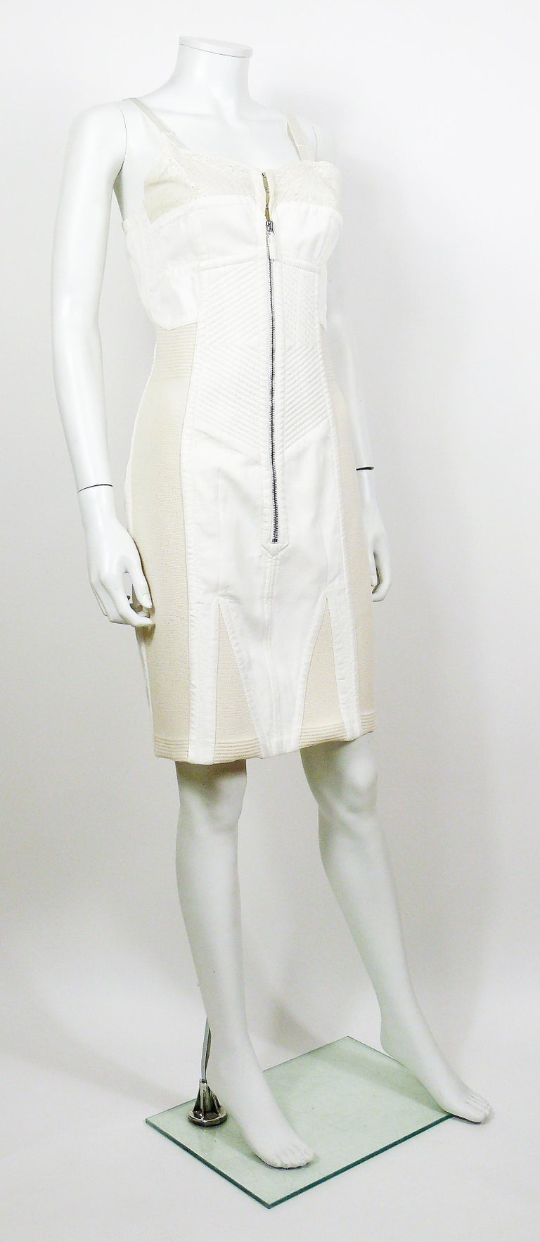 JEAN PAUL GAULTIER  rare off-white paneled corset like featuring lace bra and lingerie style straps.

This dress is made of stretch knit panels to fit to the body shape.

Label reads JEAN PAUL GAULTIER FEMME.
Made in Hungary.

Size tag reads : I 46