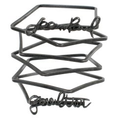Breites, geschwungenes Couture-Manschettenarmband aus schwarzem Metall von Jean Paul Gaultier