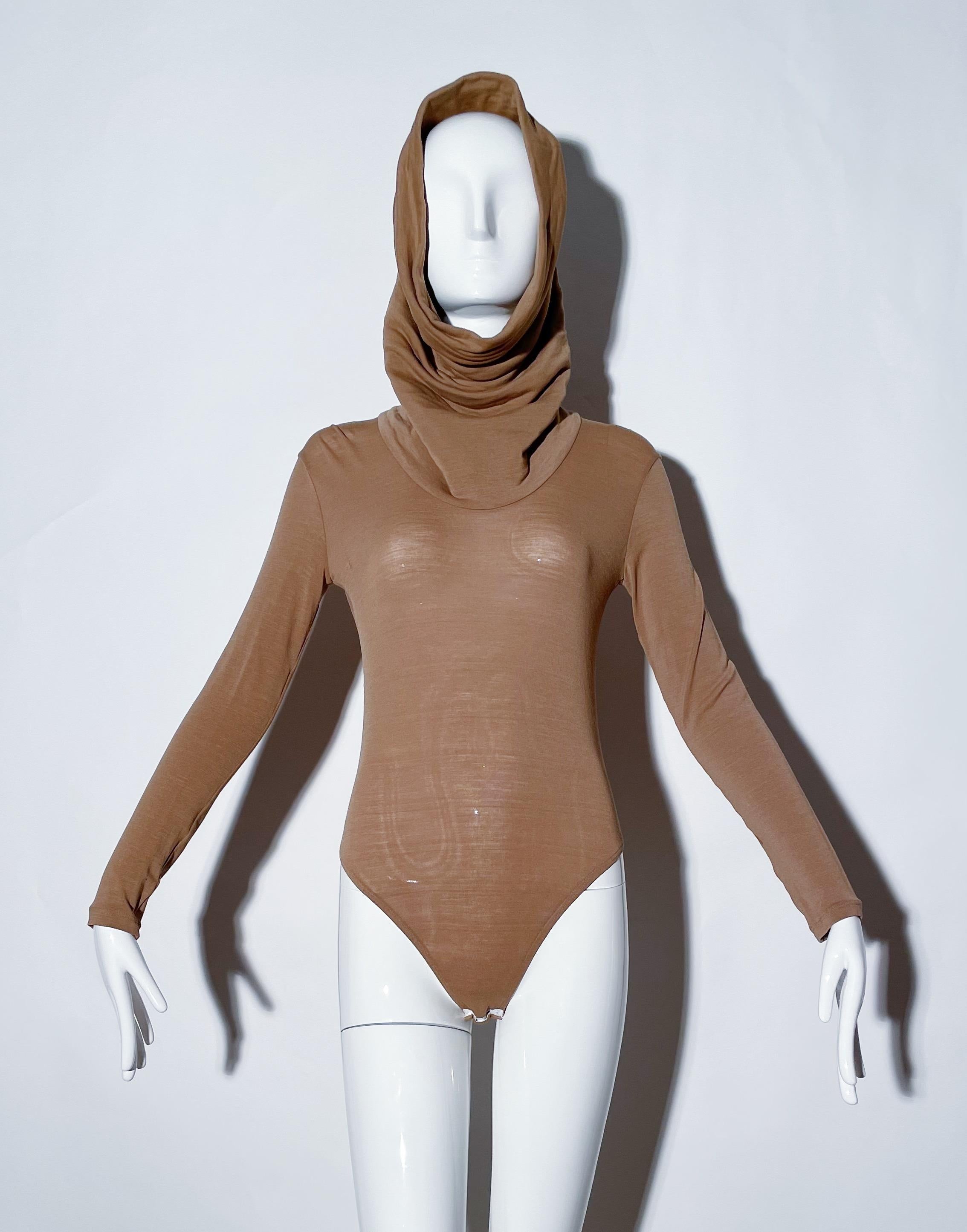 Nude cowl neck bodysuit. Giant, dramatic cowl neck. Snap gusset. Stretchy. Spandex. Made In Italy. 
*Condition: fair vintage condition, small imperfections throughout ( as pictured ) 

Marked size: 8 US, best fit for a 4/6, or medium.