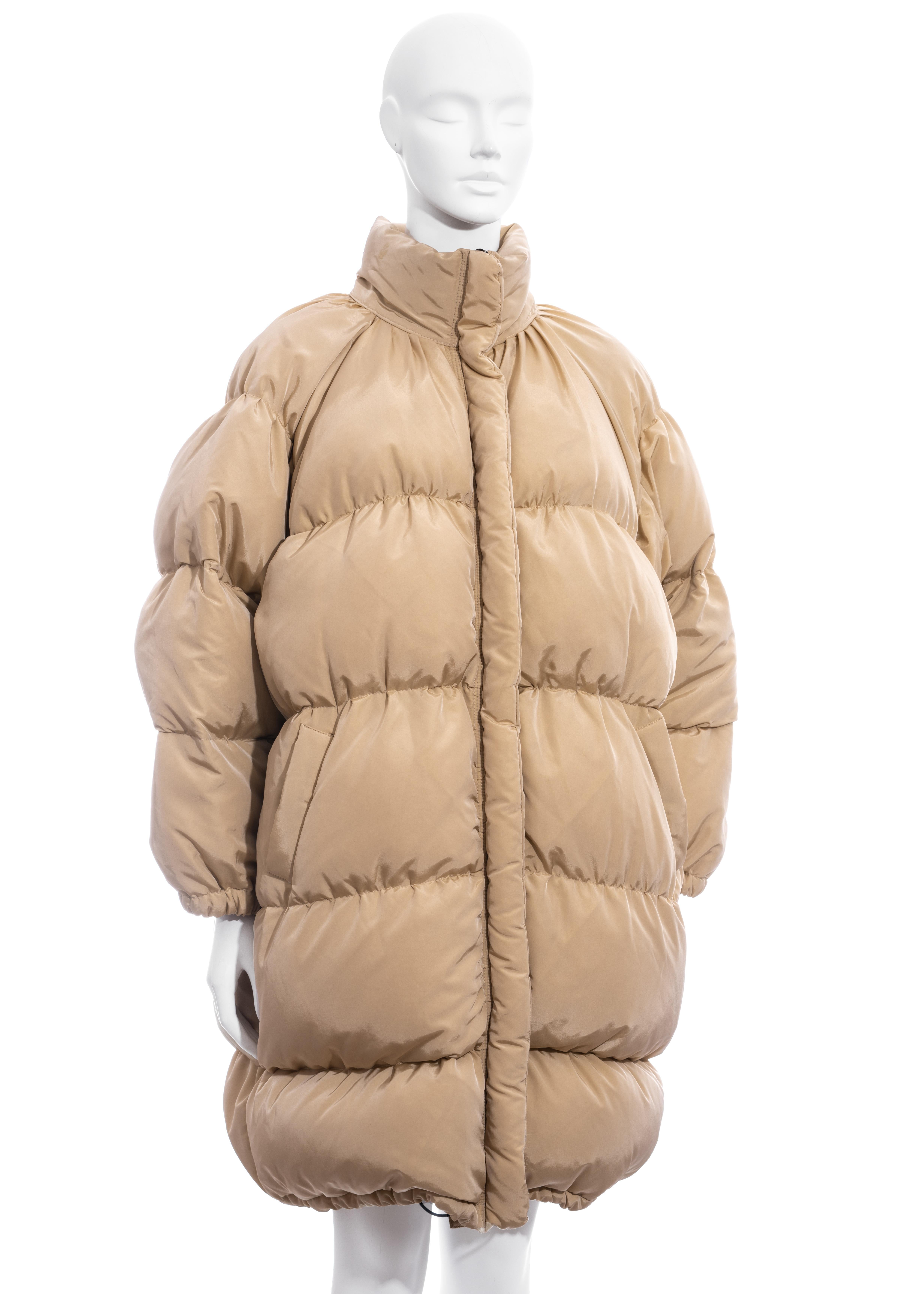▪ Jean Paul Gaultier cream puffer coat
▪ Oversized fit 
▪ Striped wool lining 
▪ Double zip front fastening 
▪ Two front pockets
▪ Size Small
▪ Fall-Winter 1999