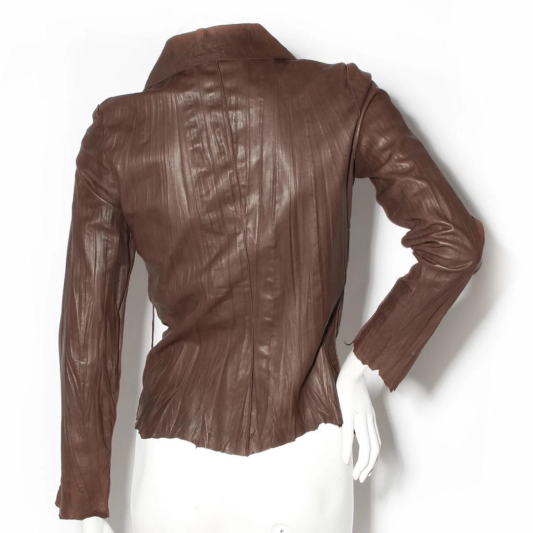 Jean Paul Gaultier Leather Jacket 
Made in Italy 
Brown lambskin leather
Zipper up front of jacket 
Crinkle texture throughout leather 
Jacket has three leather straps along torso of jacket 
Unfinished jagged finish on sleeve cuff and hem of jacket