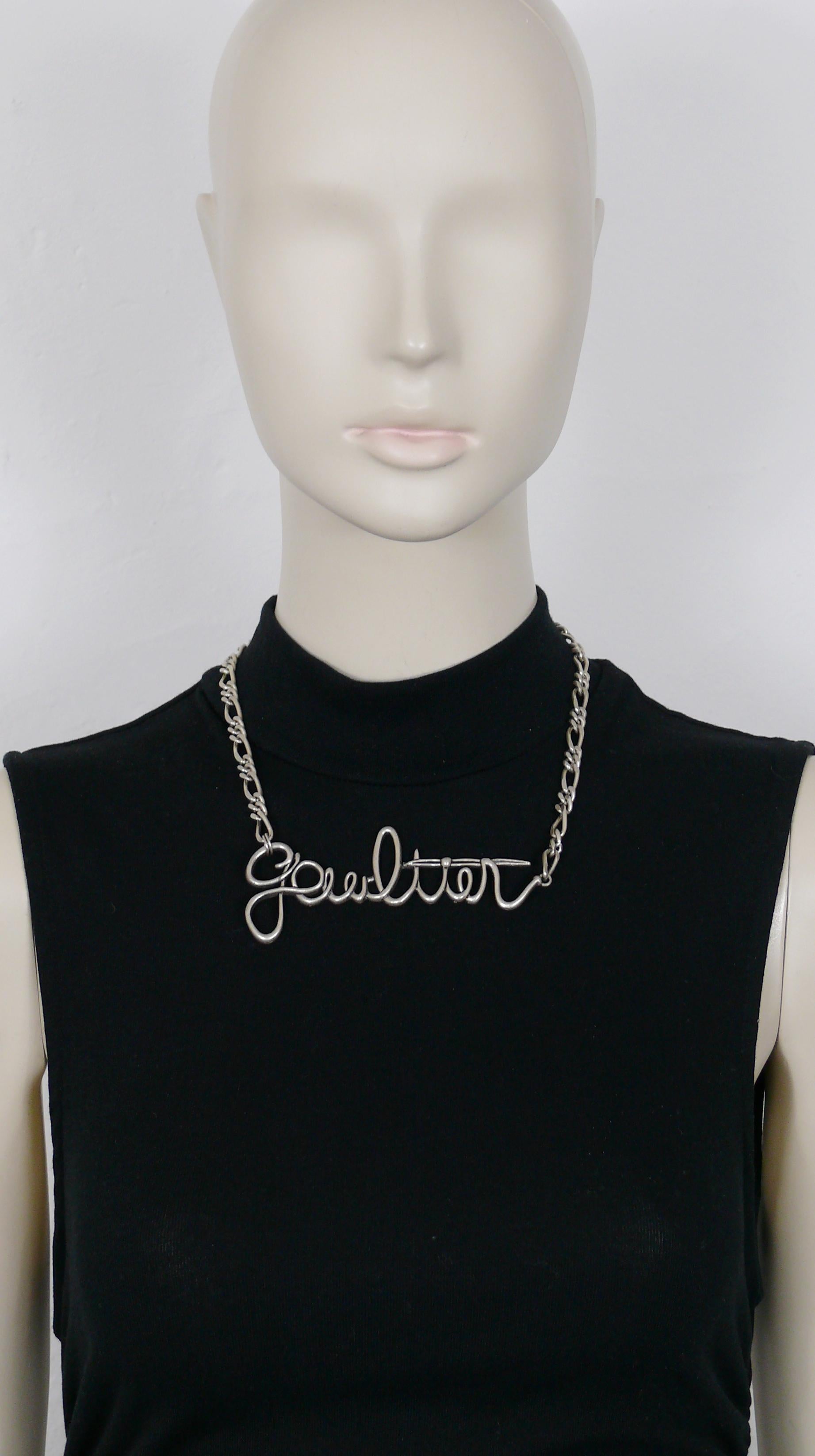 JEAN PAUL GAULTIER chain necklace featuring GAULTIER cursive signature.

Silver tone metal hardware.
Antiqued patina.

Lobster clasp closure.

Unmarked.

Indicative measurements : length approx. 48 cm (18.90 inches) / GAULTIER signature approx. max.