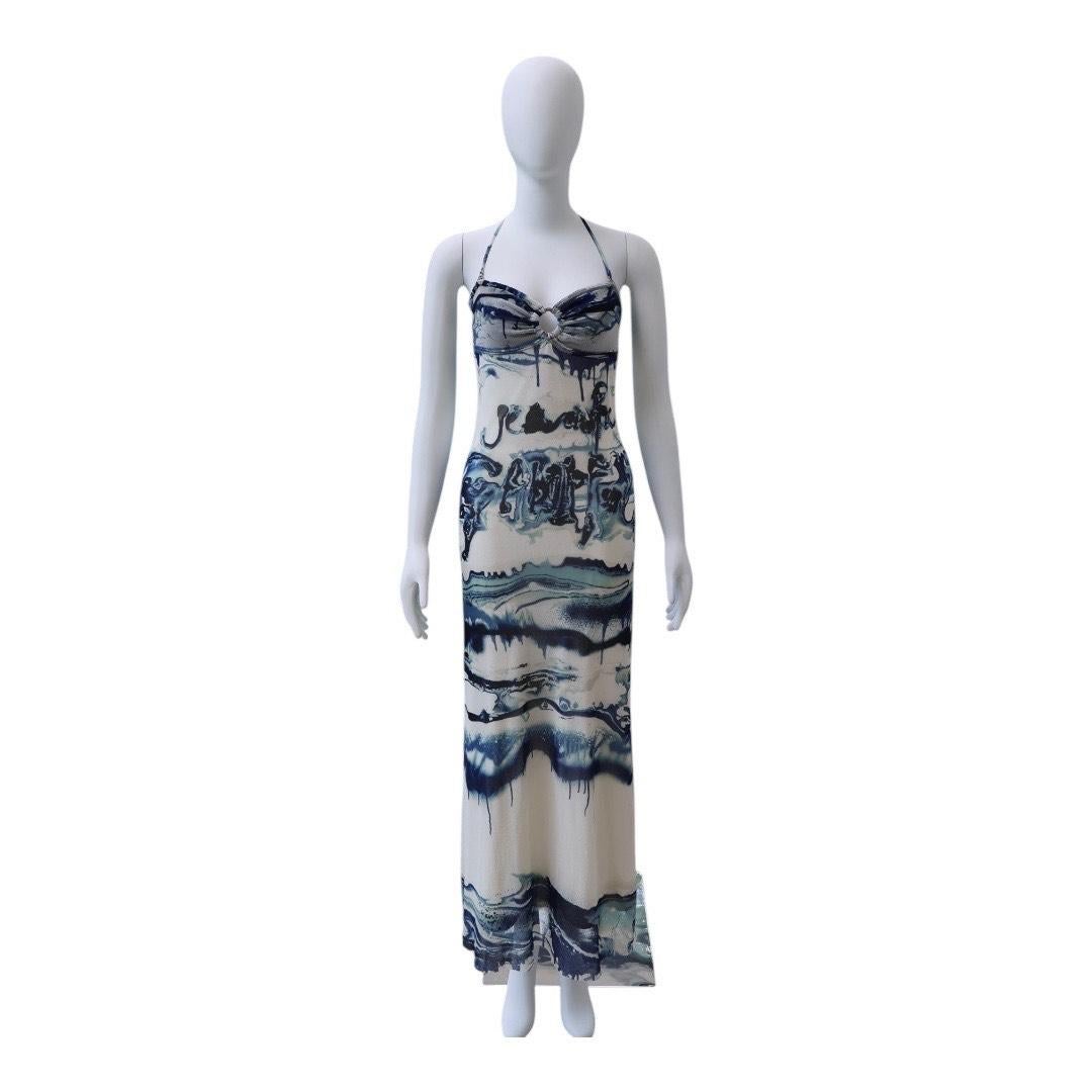 Jean Paul Gaultier “Curve” Printed Mesh Dress 

A sculptural take on JPG’s signature mesh moment, this brand new Jean Paul Gaultier maxi dress features an abstract wave-like “Curve” print in navy and cream tones. Designed with a strapless sweetheart