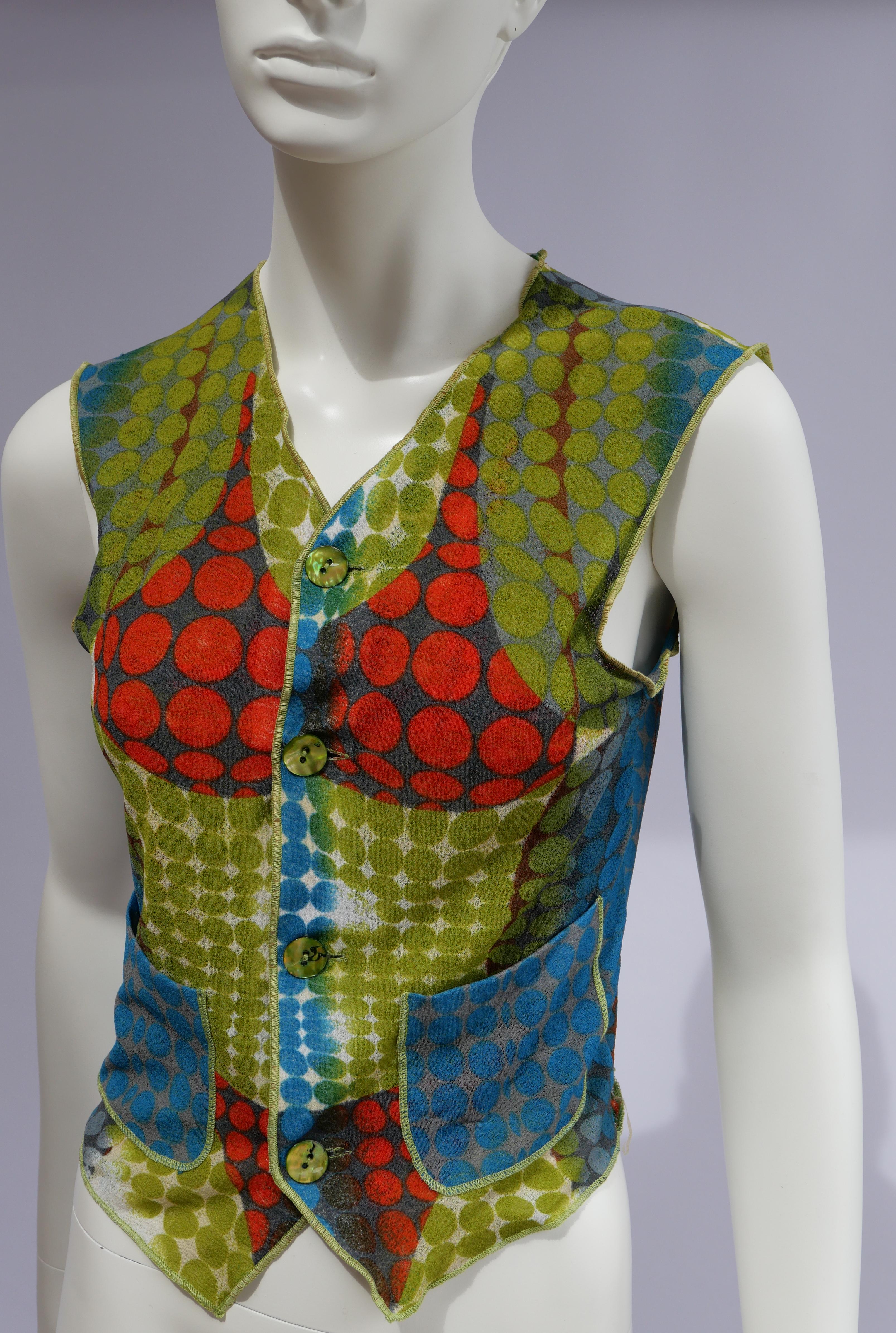 Jean Paul Gaultier Cyber Vest Top 1995AW 
This piece is from the Fall/Winter 1995 'Cyber' collection by Jean Paul Gaultier. Within this collection Gaultier references technology and a dystopian future. The print on this top is inspired by the work