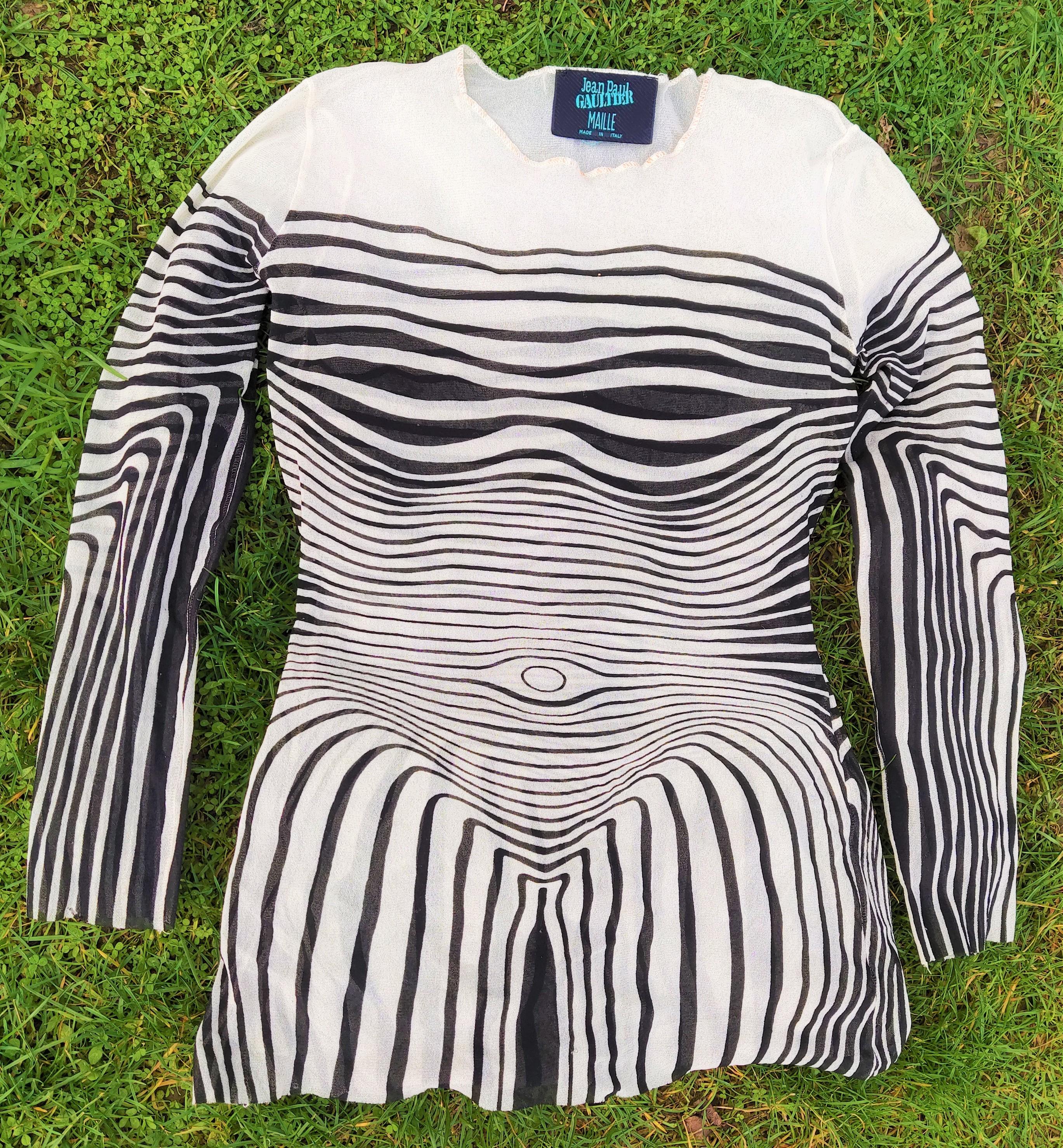 Iconic Optical Illusion Top by Jean Paul Gaultier!
1996 Spring Summer Collection!

One of the most iconic Jean-Paul Gaultier Prints, initially showed at Spring-Summer 1996 collection, which is now a part of MET Costume Institute’s Archive and
