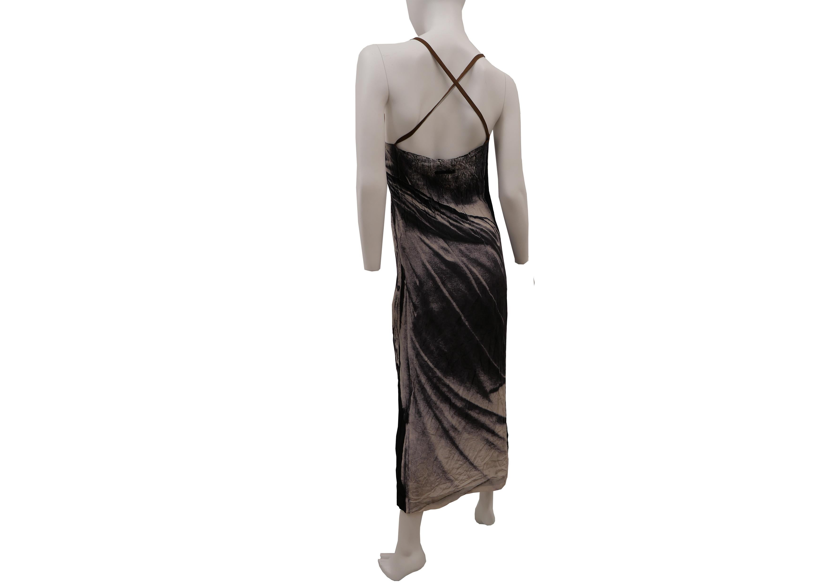 Jean Paul Gaultier Dress Spring/Summer 1999
'The figure of a Hellenic statue wearing a draped cloth features both on the front as well as on the backside of this spring/summer 1996 dress by Jean Paul Gaultier. The trompe l'oeil effect of