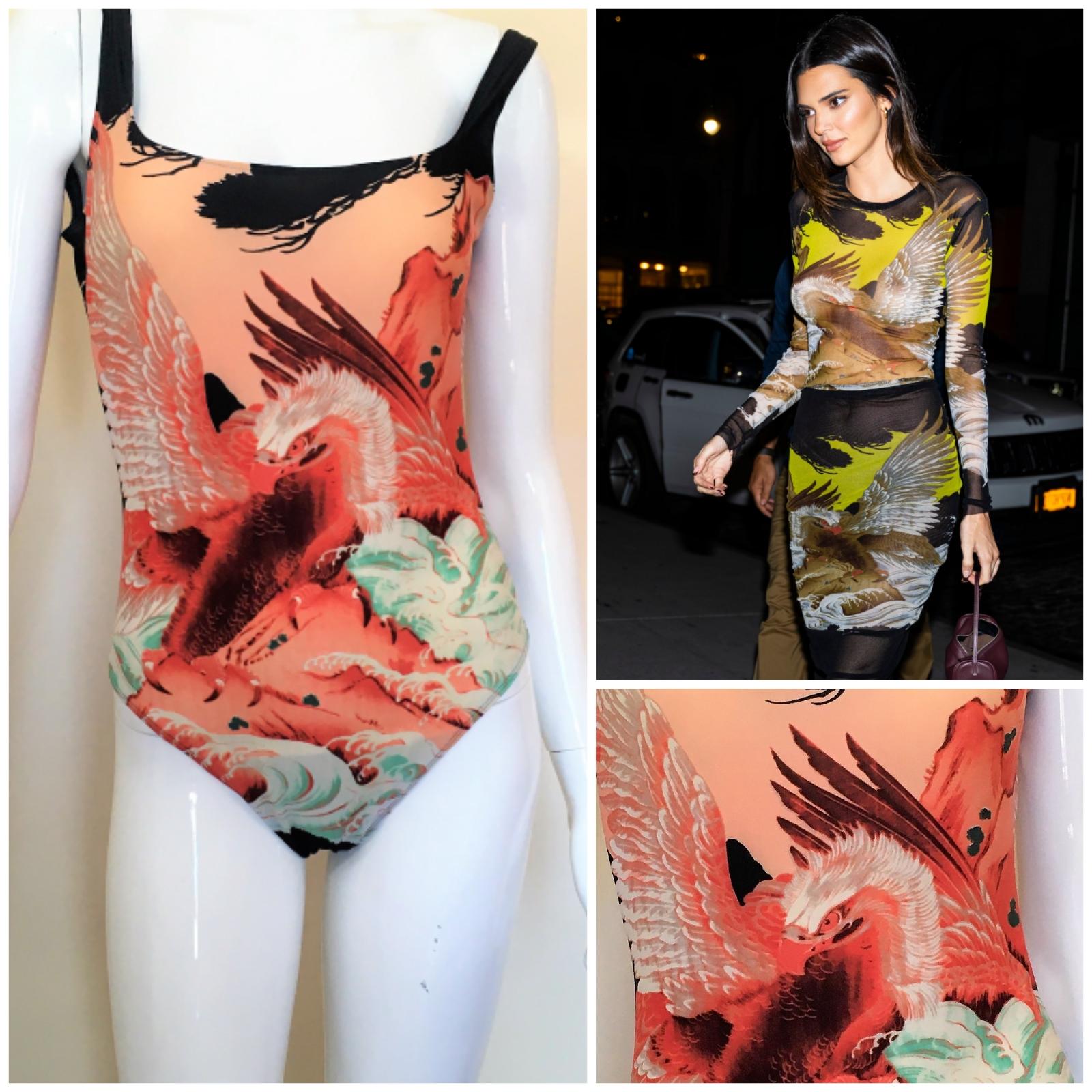 Golden Japanese Eagle one piece swimsuit by JEAN PAUL GAULTIER!
Wonderful piece from the 90s!
Kendall Jenner worn the same pattern in New York, October 2021. 

EXCELLENT condition!

SIZE
It fits from medium to large.
Stretchy fabric.
No size