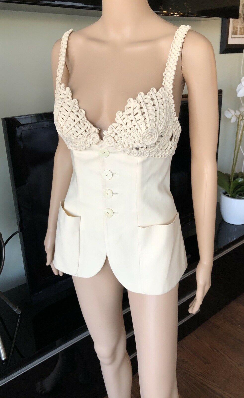Jean Paul Gaultier S/S 2007 Runway Embroidered Cups Top and Jacket 2 Piece Set IT 38

Creme Jean Paul Gaultier two-piece set. Cropped jacket features structured shoulders and open front. Sleeveless top features dual pockets and button closures at