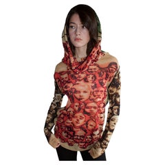 Top de malla «Faces» de Jean Paul Gaultier, colección otoño-invierno 1992, en excelente estado