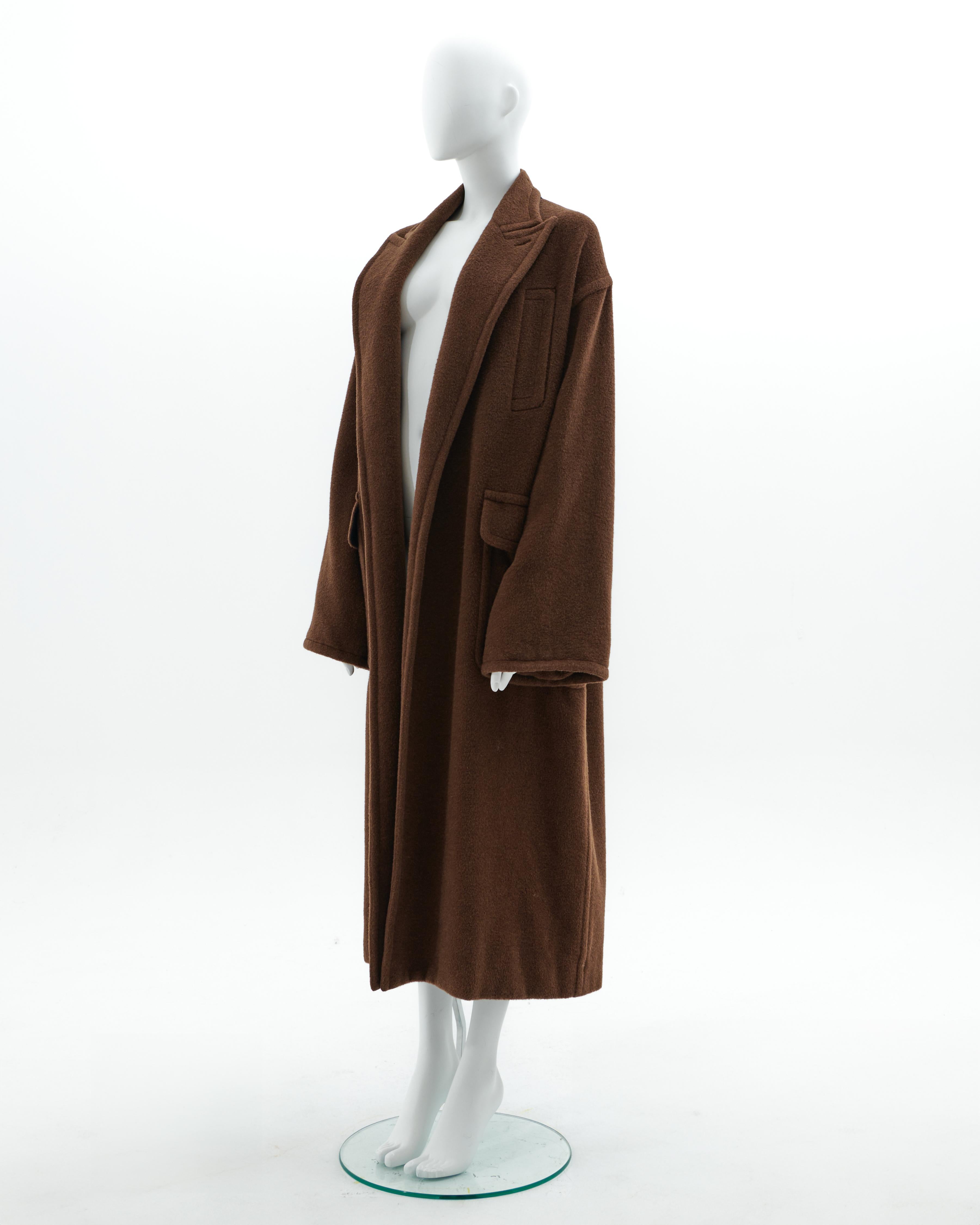 - 'Le Grand Voyage' collection 
- Sold by Skof.Archive 
- Fall-Winter 1994/95
- Fully printed silky lined with taurus zodiac sign all over
- Oversized fit
- Floor-length caramel wool coat
- Made in Italy

Condition: Excellent

Size: FR 40 - EN 44 -