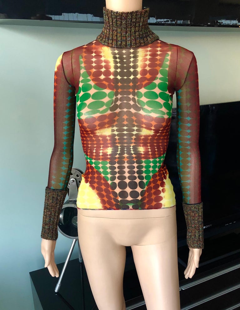 Jean Paul Gaultier F/W 1995 Runway Iconic Cyber Dots Sheer Top 

Excellent Condition! Please note size tag has been removed but the material is very stretchy and will best fit size XS/S/M. 

