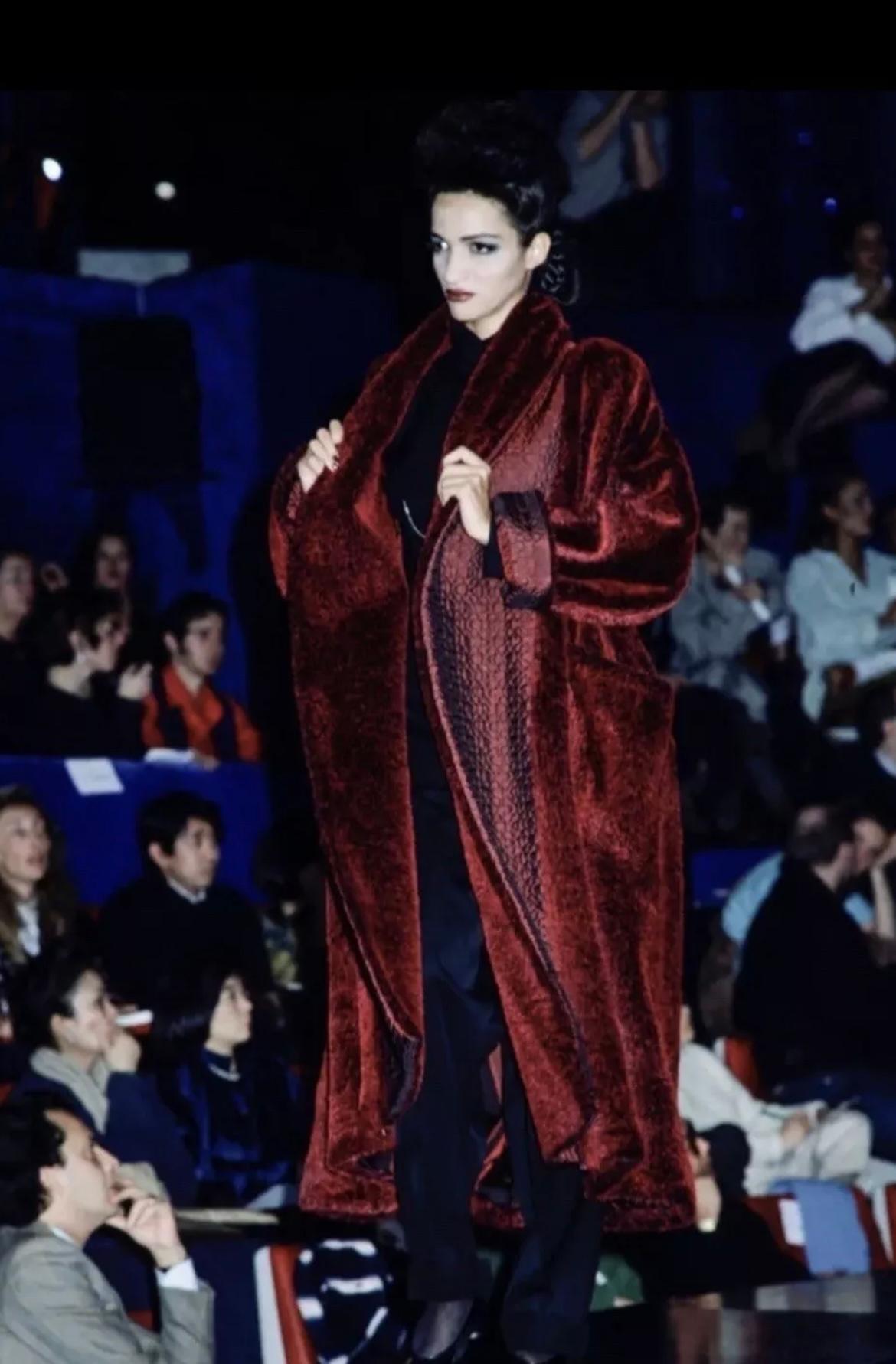 Jean Paul Gaultier 'Gibo' coat, in blue faux fur. From the Fall/Winter 1985 collection,  as seen on the runway. Very oversized design, with large pockets to front and quilted lining trims.

Condition
Good vintage condition. Slight discoluration to
