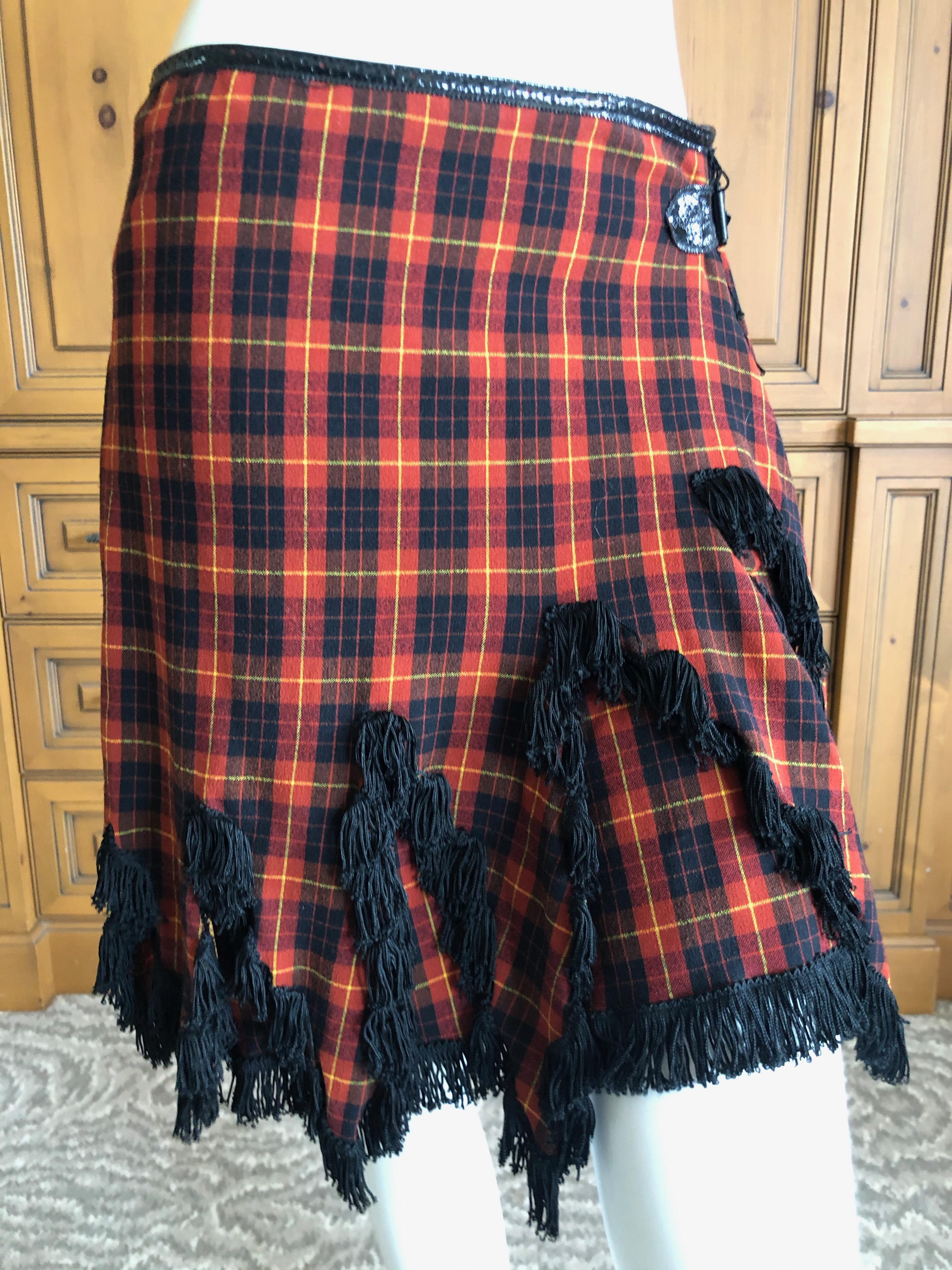 Jean Paul Gaultier Femme Fringed Tartan Wrap Skirt with Patent Leather Trim.
This is a wrap style skirt, and is much better in person.
The skirt is cut like 