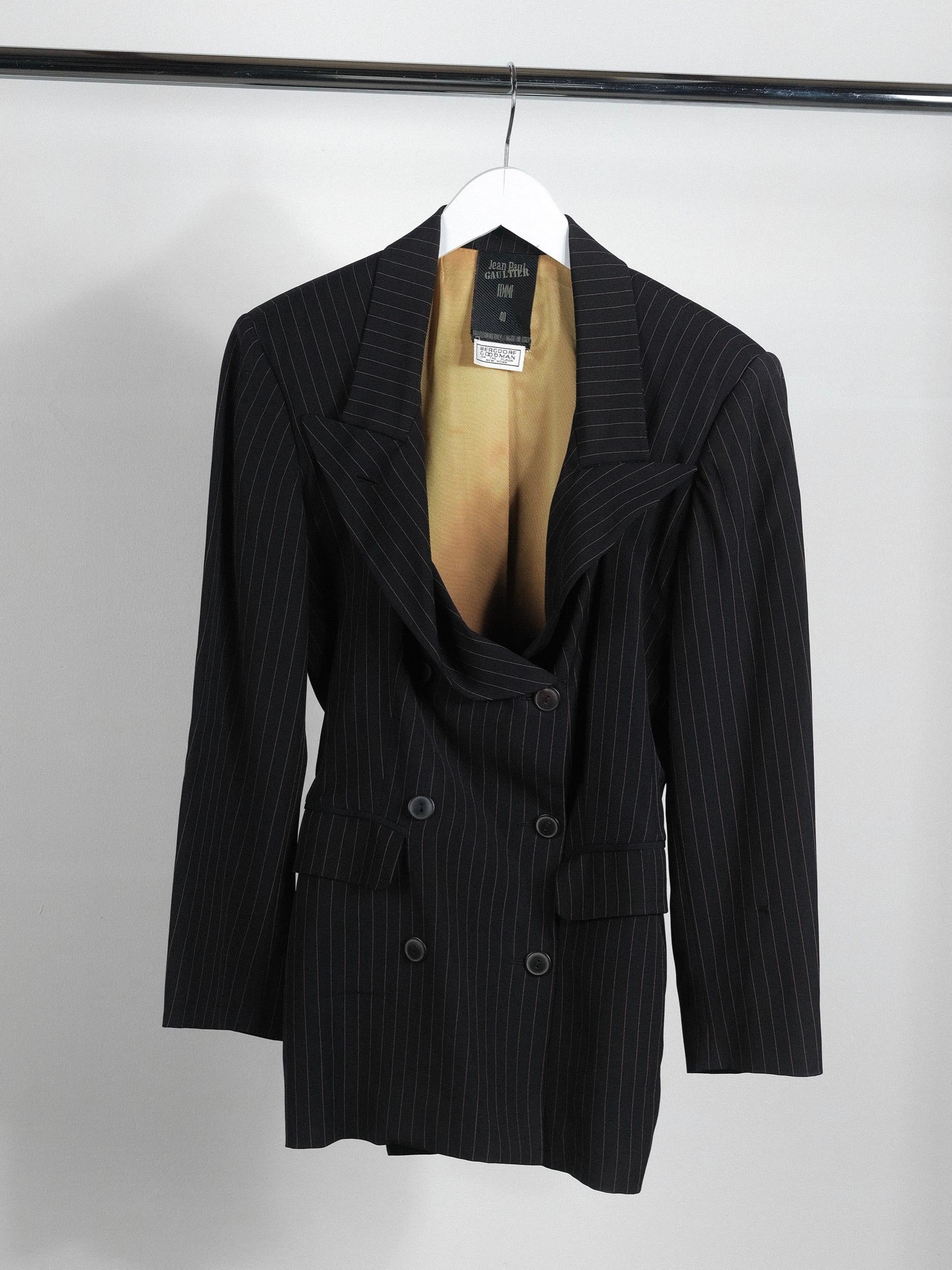 Fabulous Jean Paul Gaultier Pinstripe Jacket with lapel detail. 
Orange warm pinstripe on navy crisp wool.
Folder lapel detail
Double breasted

Madonna is pictured in this exact style on the cover of August 1989 Esquire Magazine and wore this same