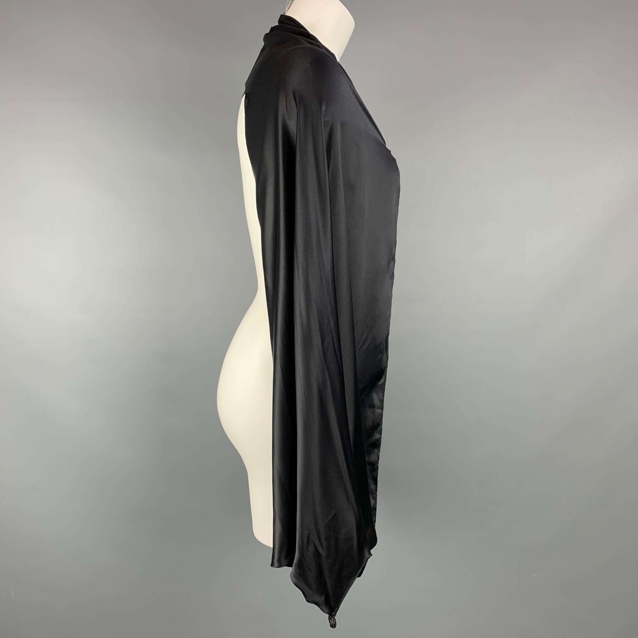 JEAN PAUL GAULTIER sleeves comes in a black satin featuring a oversized style with a buttoned closure. Made in Italy.

Very Good Pre-Owned Condition.
Marked: No size marked

Measurements:

Sleeve: 29.5 in.
