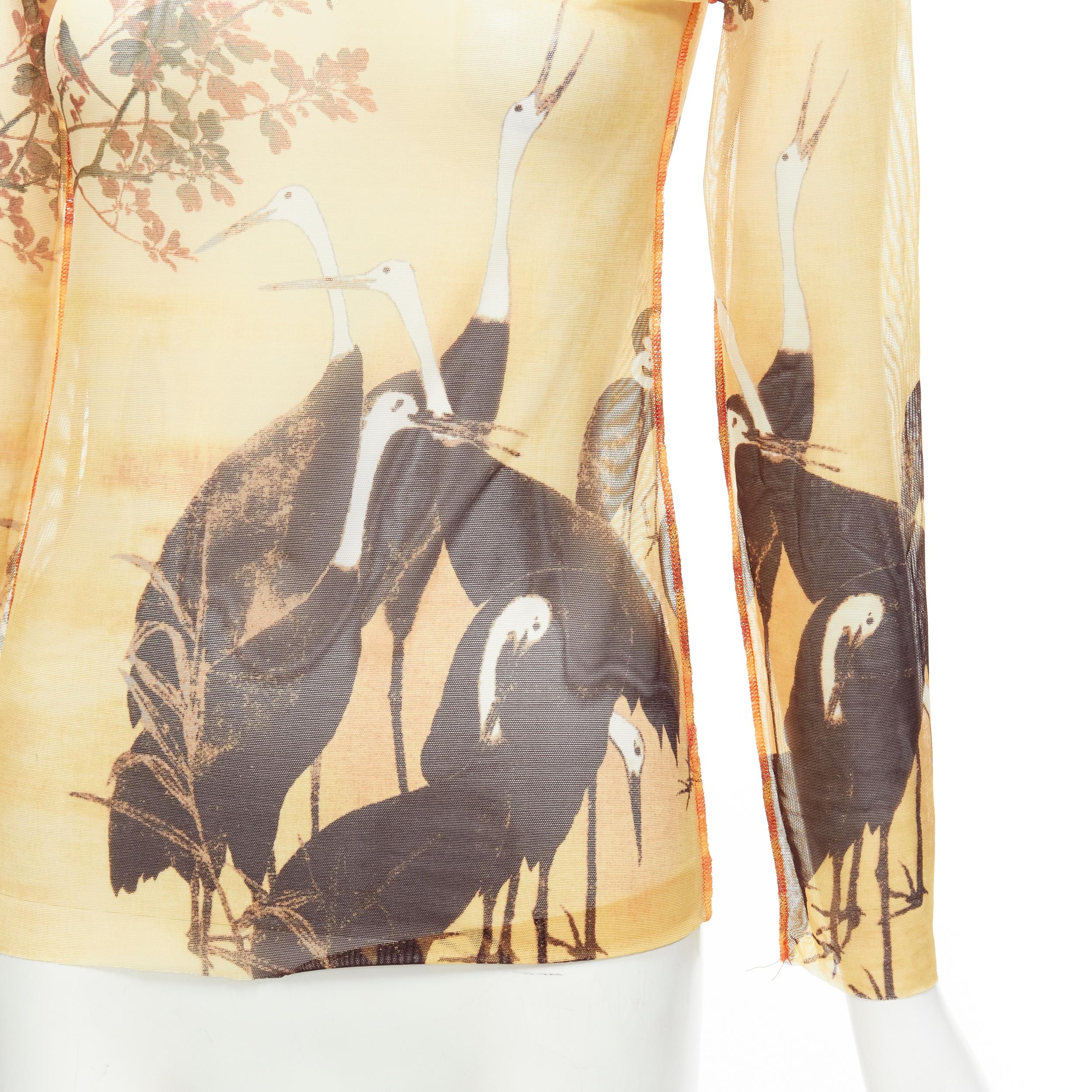 JEAN PAUL GAULTIER FEMME yellow crane mountain sheer crew mesh top IT40 S
Reference: TGAS/C01749
Brand: Jean Paul Gaultier
Designer: Jean Paul Gaultier
Material: Econyl, Blend
Color: Multicolour
Pattern: Photographic Print
Closure: Pullover
Made in: