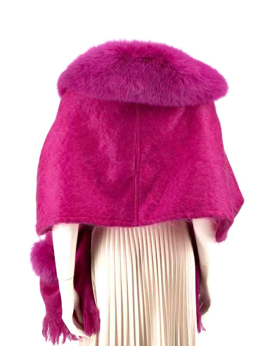 CONDITION is Very good. Hardly any visible wear to the poncho is evident on this used Jean Paul Gaultier designer resale item.
 
 
 
 Details
 
 
 Fuchsia
 
 Wool
 
 Cape
 
 Fox fur trim
 
 2x Front pockets
 
 Internal leather fastening
 
 
 
 
 
