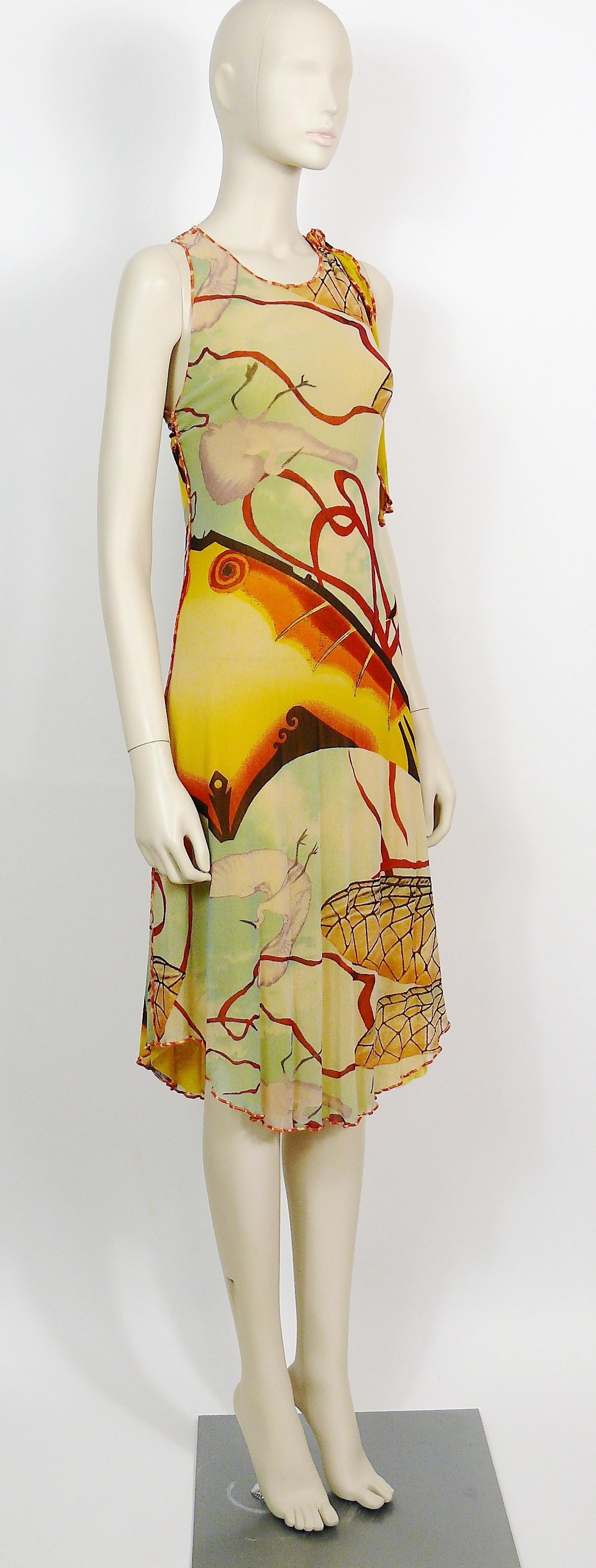 JEAN PAUL GAULTIER FUZZI mesh summer dress featuring an abstract print with insect/butterfly wings, birds, tropical fish in acid colors. 

Slips on.

Label reads JEAN PAUL GAULTIER MAILLE FEMME.
Made in Italy.

Missing size tag.
Please refer to
