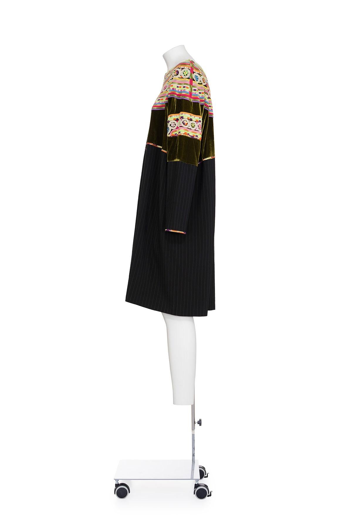 80's tunic with multicolor embroidery and velvet top by Jean Paul Gaultier.
Pinstripe wool bottom part.
The composition tag is missing, seems to be made of wool.