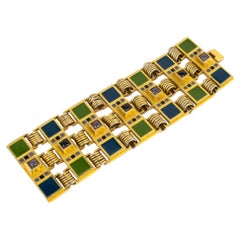 Jean Paul Gaultier Pulsera grande de metal dorado con cabujones de esmalte