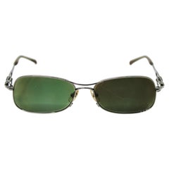 Lunettes de soleil Jean Paul Gaultier à monture métallique et verres teintés verts, datant des années 1990 environ