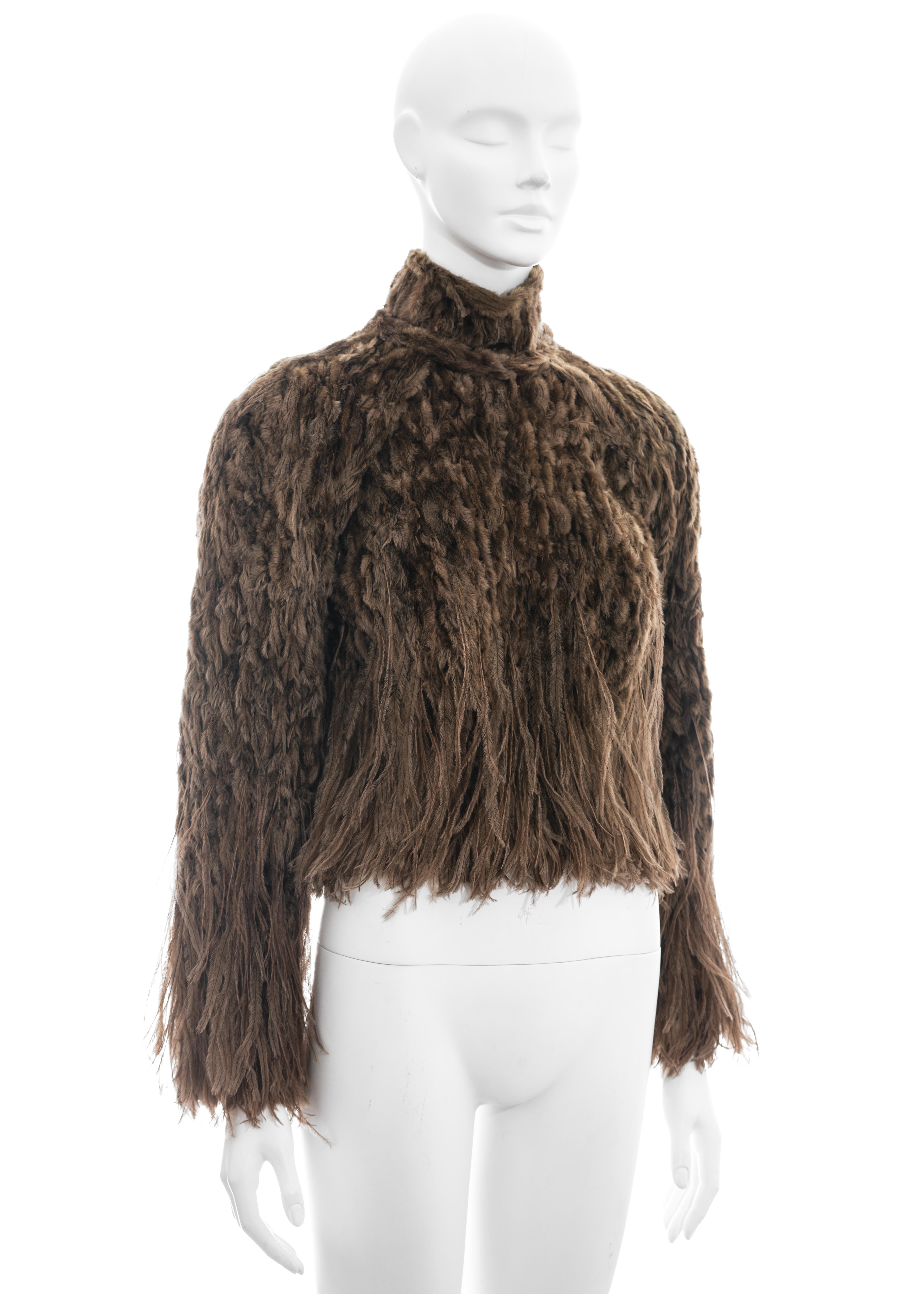 ▪ Jean Paul Gaultier Haute Couture woven fur top
▪ Ostrich feathers
▪ Rabbit fur
▪ Silk organza lining
▪ Metal zip back fastening 
▪ High neck
▪ Approx. FR 38 - UK 10 - US 6
▪ Fall-Winter 1999
