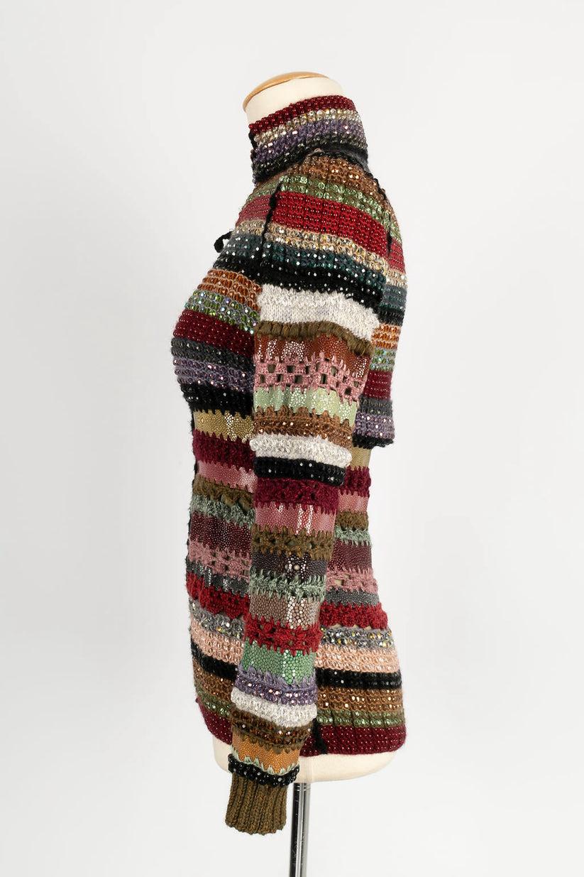 Jean-Paul Gaultier -Patchwork vest made of strips of knitting and shagreen in color. 
Haute Couture Collection Spring-Summer 2006. 
No size or composition label, it fits a size 36FR.

Additional information:

Dimensions: 
Shoulder width: 37 cm