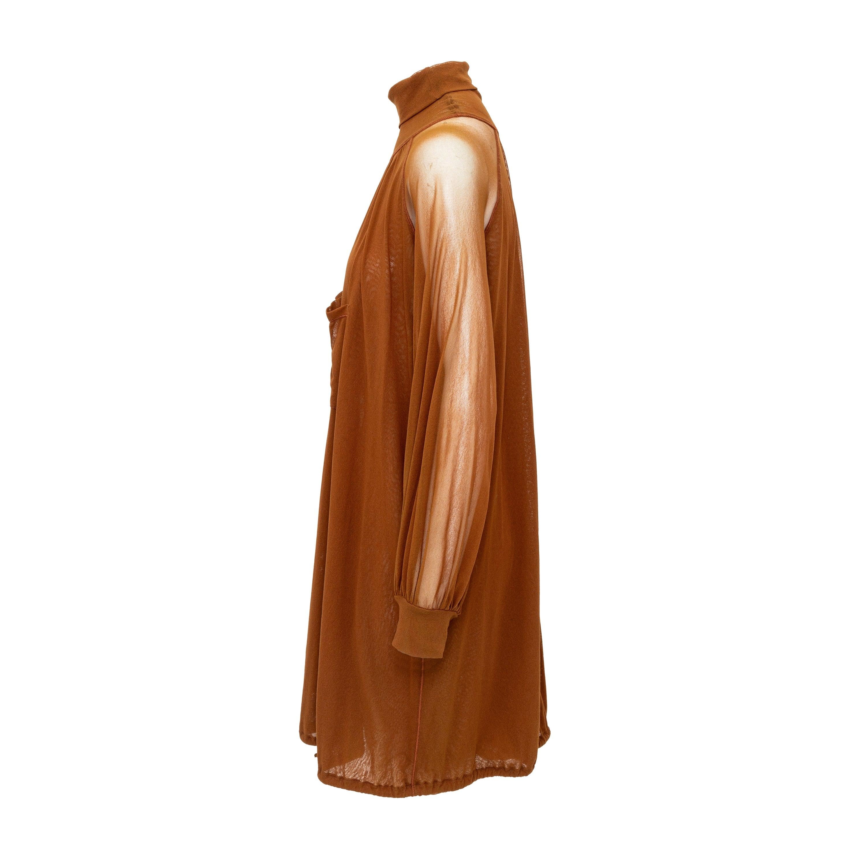 Elevate your style game with the Jean Paul Gaultier Highneck Mesh Dress from the 2000s Soleil label. Made from rich brown nylon mesh, this dress features a high neck design that can be folded over, relaxed raglan sleeves with gathering at the hem,