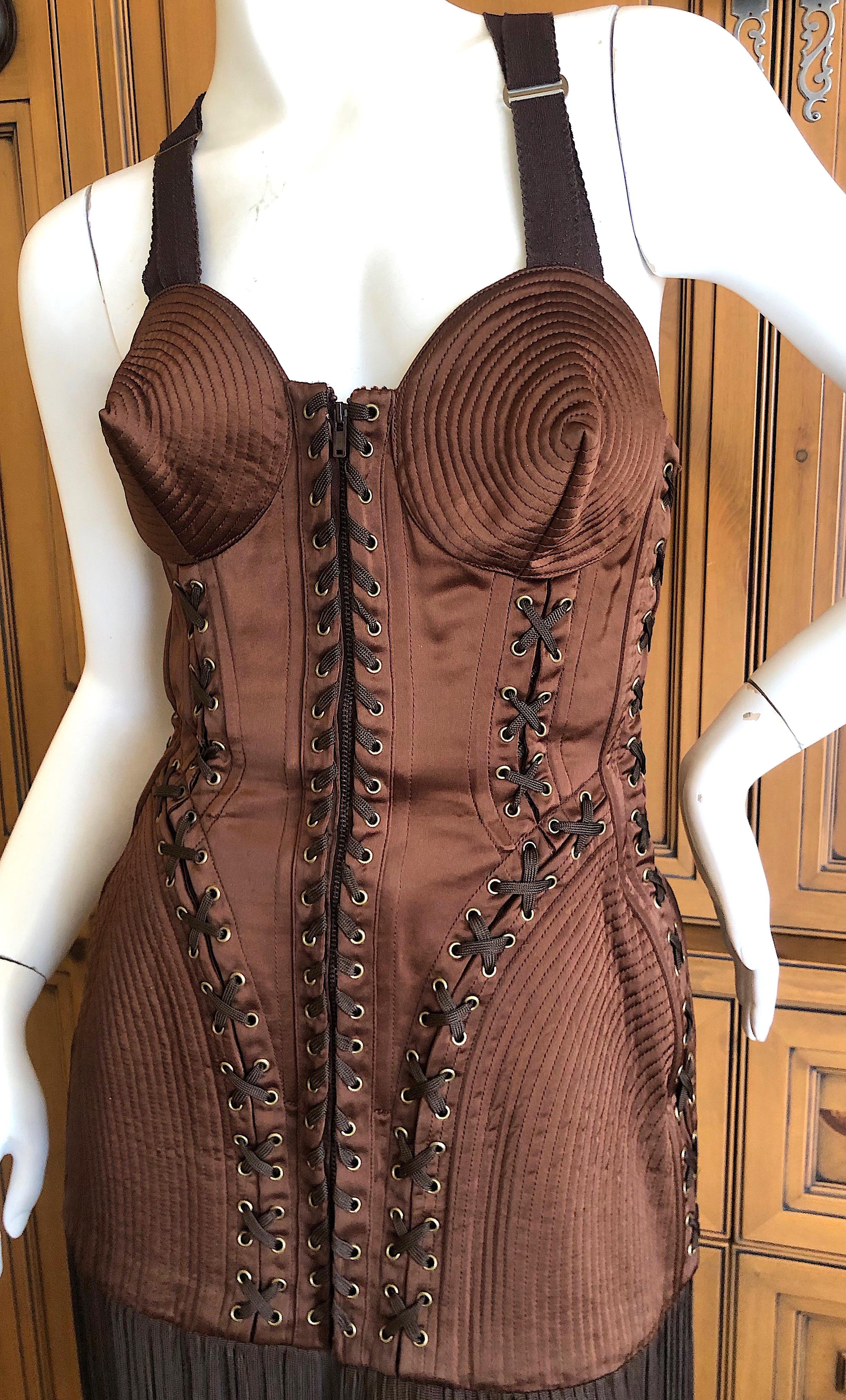 Jean Paul Gaultier Iconic 1989  Cone Bra Corset with Fringe
This is a really rare 1989 corset dress, which was made in gold for Madonna's Blond Ambition tour, in which she famously performed 