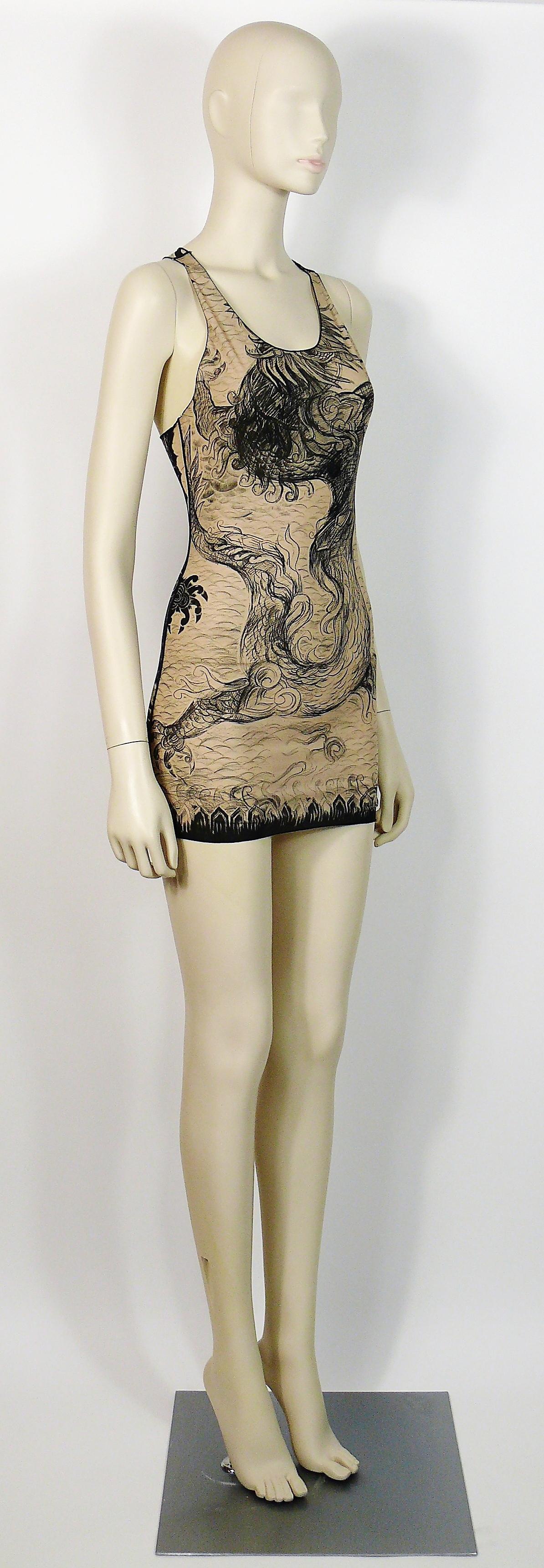 JEAN PAUL GAULTIER stretchy sheer tank mini dress featuring a black Japanese dragon inspired tattoo print.

Label reads JEAN PAUL GAULTIER Femme Made in Italy.

Size tag reads : I 42 / D 38 / F 38 / GB 10 / USA 8.
Please refer to