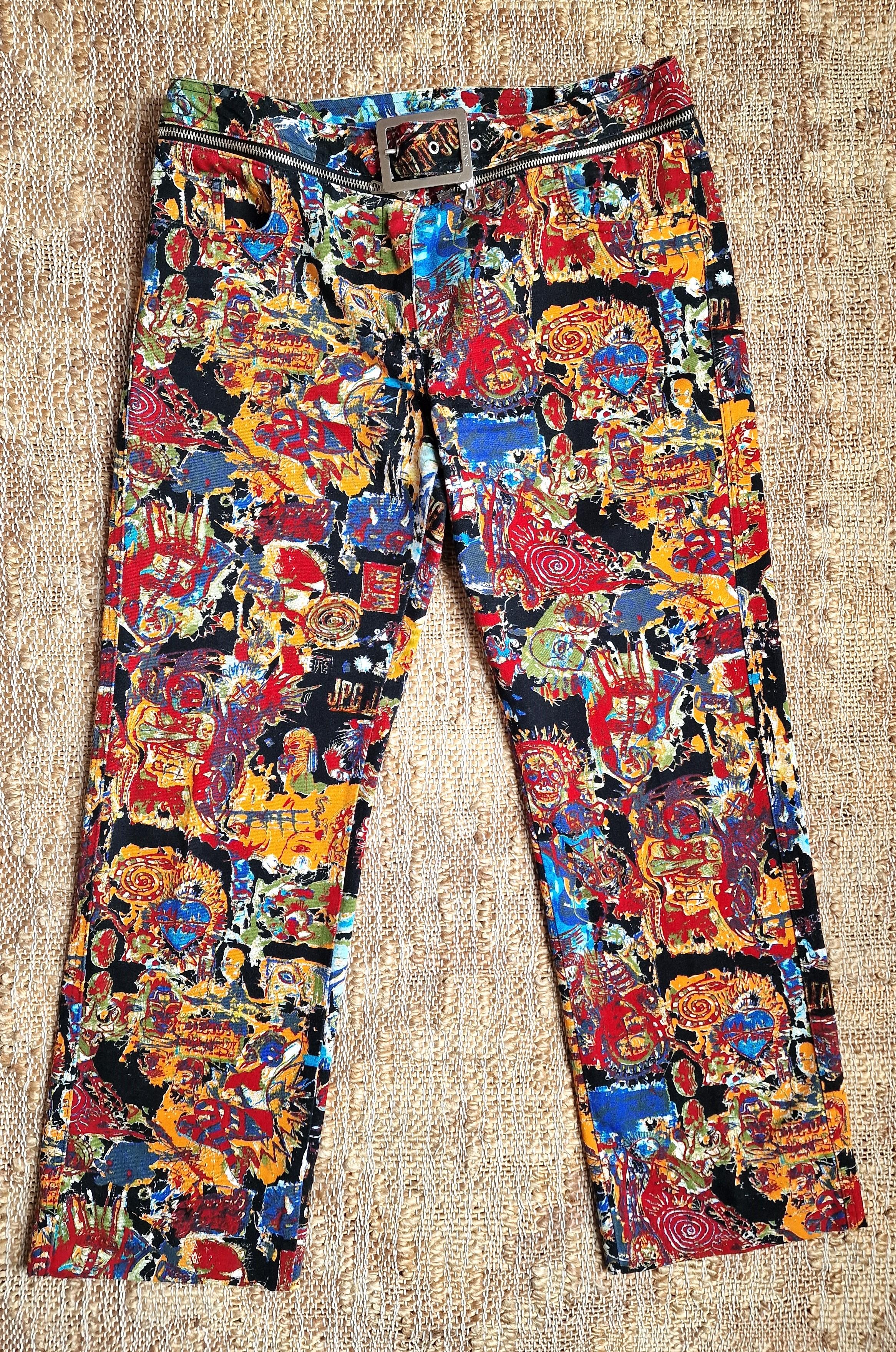 Jean-Michel Basquiat pattern pants by Jean Paul Gaultier! 

Jean-Michel Basquiat was an American artist . Basquiat's art focused on dichotomies such as wealth versus poverty, integration versus segregation, and inner versus outer experience. He