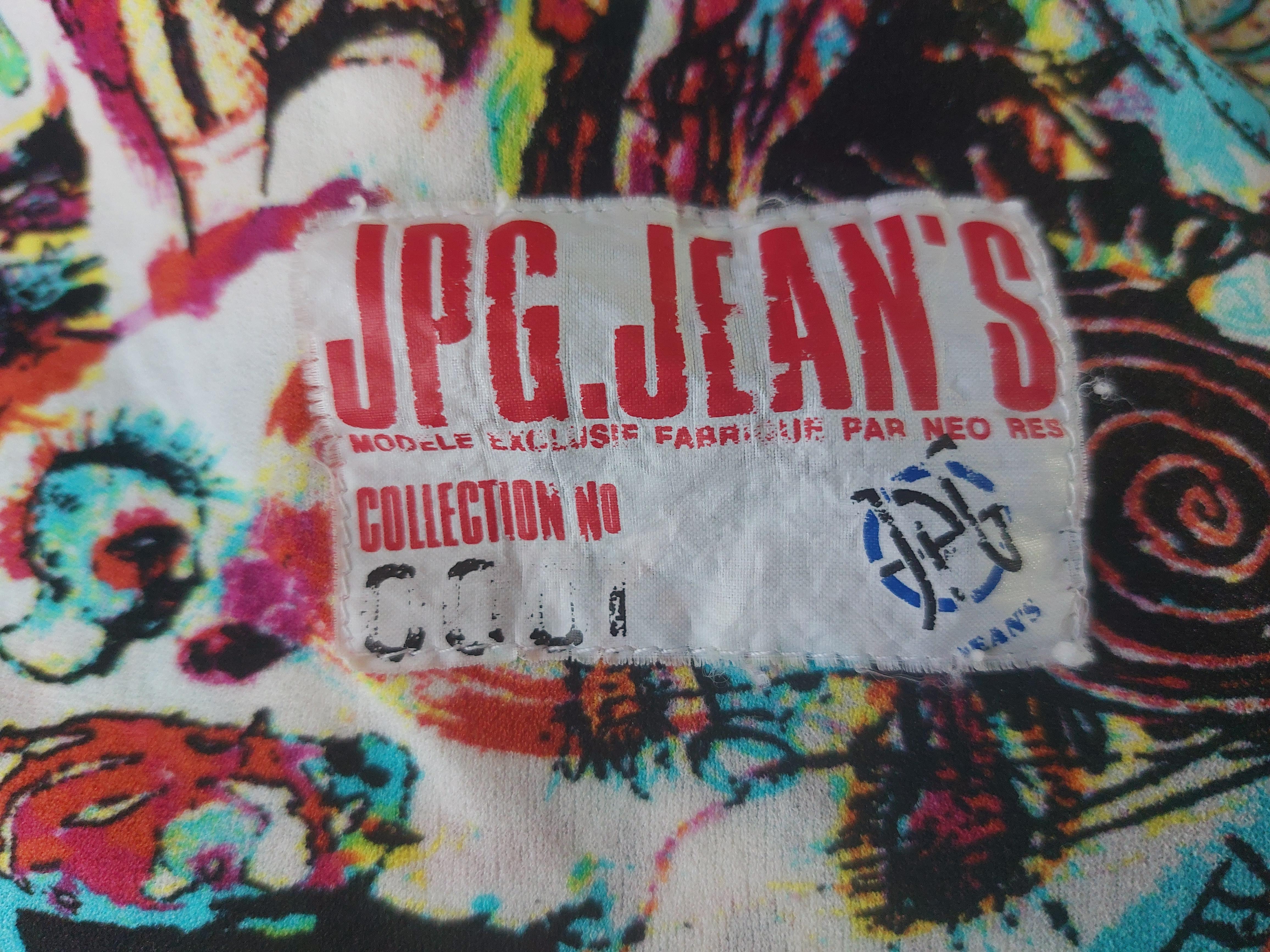 Jean Paul Gaultier JPG Basquiat Opaque mesh sketch graffiti comic street art vintage 90s Optical Butterfly Maxi Long Tattoo Dress Robe

Long dress Jean Paul Gaultier Jeans 0001 collection, in extensible opaque mesh with graffiti patterns, sketch JPG