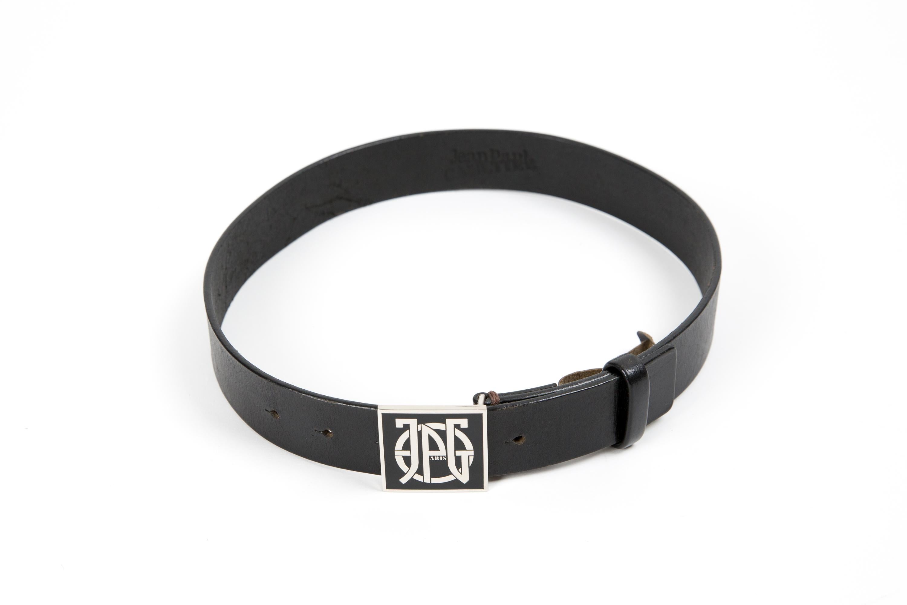 Jean Paul Gaultier JPG black leather belt featuringa square” JPG” buckle, an inside pitted brand. 
Circa 2000s
In good vintage condition. Made in France. 
Estimated size 65FR
We guarantee you will receive this gorgeous item as described and showed