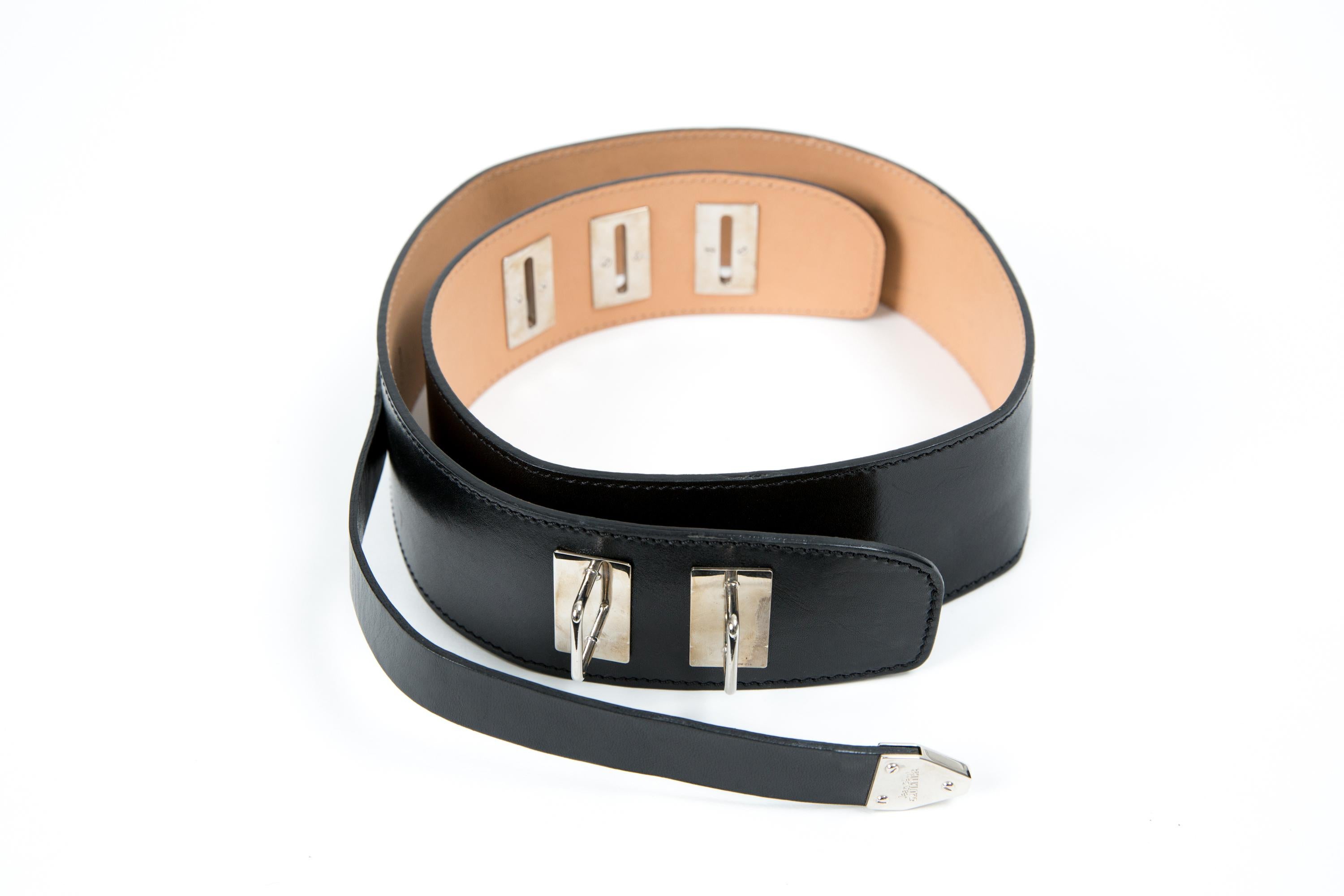 Jean Paul Gaultier JPG black leather corset belt featuring silver tone hardware, a large width, logo pitted on the buckle. 
In good vintage condition. Made in France. 
Estimated size 80fr
Total Length 35in. (89 cm)
Width 2in. (5.5cm)
We guarantee