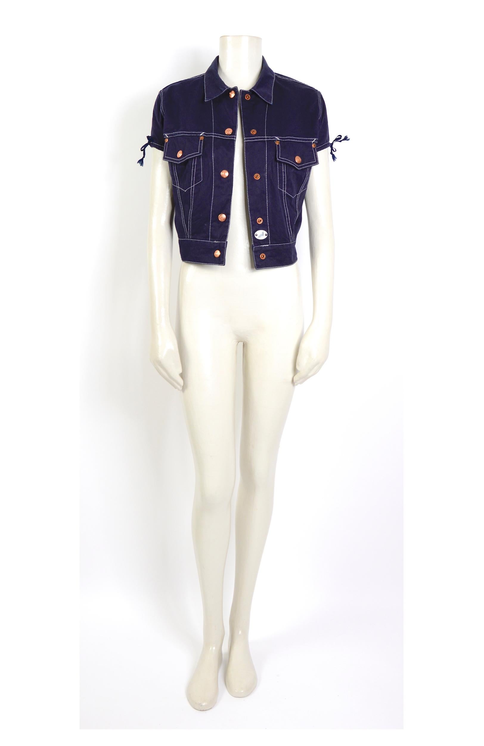 Jean-Paul Gaultier junior 100% cotton jeans short sleeves jacket 
Made in Italy - Size 42 
The jacket goes with the bermuda shorts we have listed, separately, unfortunately, the jacket was worn and washed less making the color a touch darker than