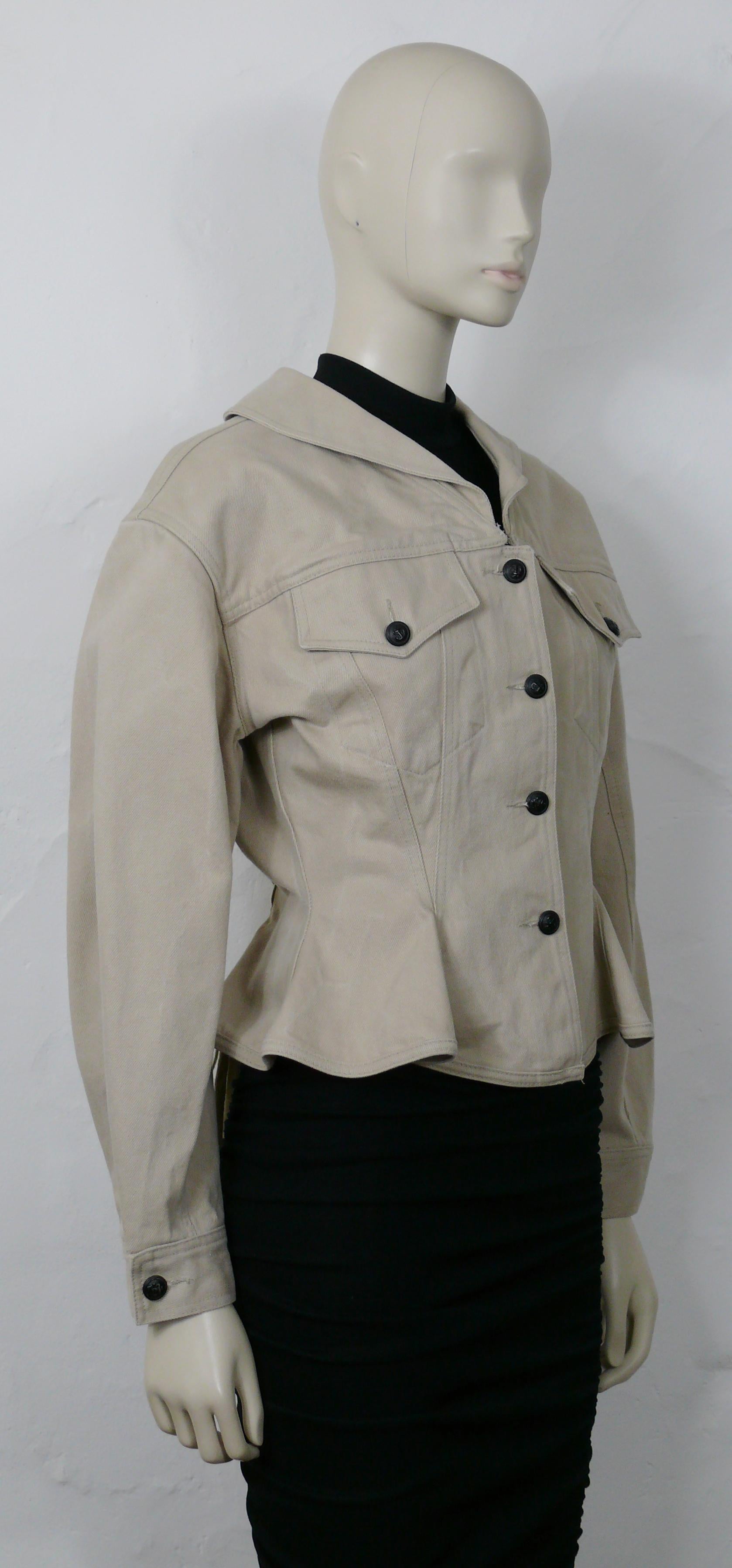 JEAN PAUL GAULTIER Junior vintage beige denim peplum jacket laced in the back

This jacket features :
- Beige denim fabric.
- Sailor collar.
- Front button down fastening.
- Back lace up detail.
- Peplum waist.
- Long sleeves with cuff buttoning.
-