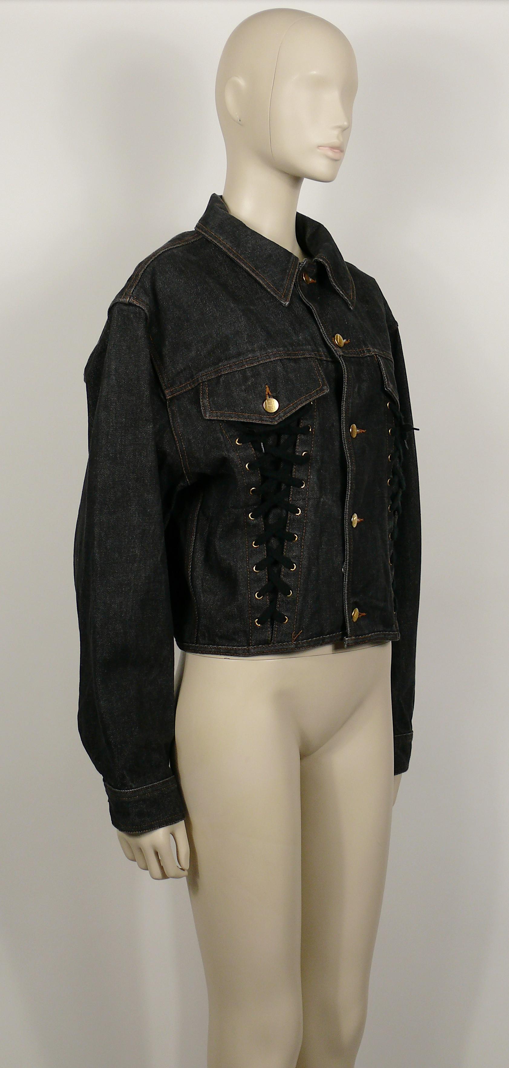 JEAN PAUL GAULTIER Junior vintage black denim iconic corset style jacket.

This jacket features :
- Distressed black denim.
- Classic collar.
- Front button down fastening.
- Front lace up detail.
- Long sleeves with button cuffs
- Pocket detail at