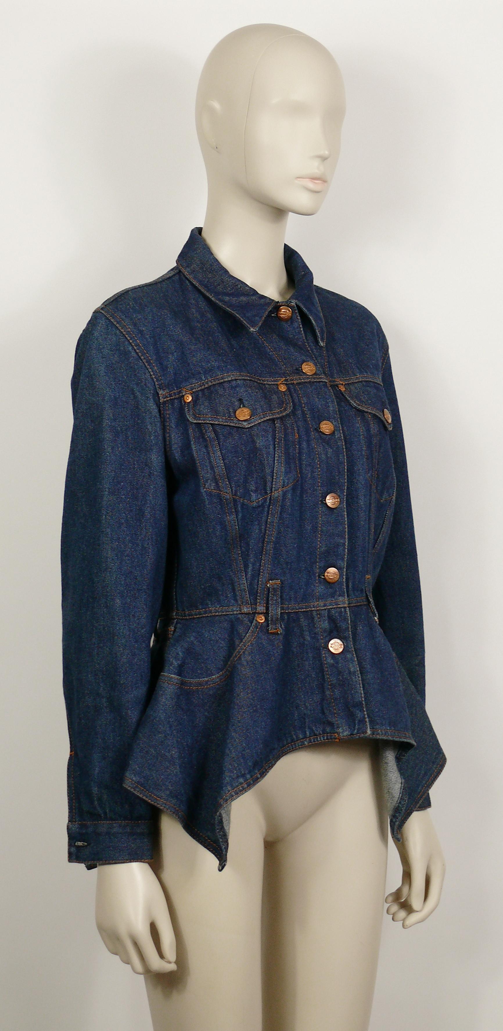JEAN PAUL GAULTIER Junior vintage blue denim peplum jacket.

This jacket features :
- Peplum cut design.
- Long sleeves.
- Button down closure.
- Cuff buttoning.
- Copper toned buttons and rivets embossed JUNIOR.
- Four front pockets.
- Two back