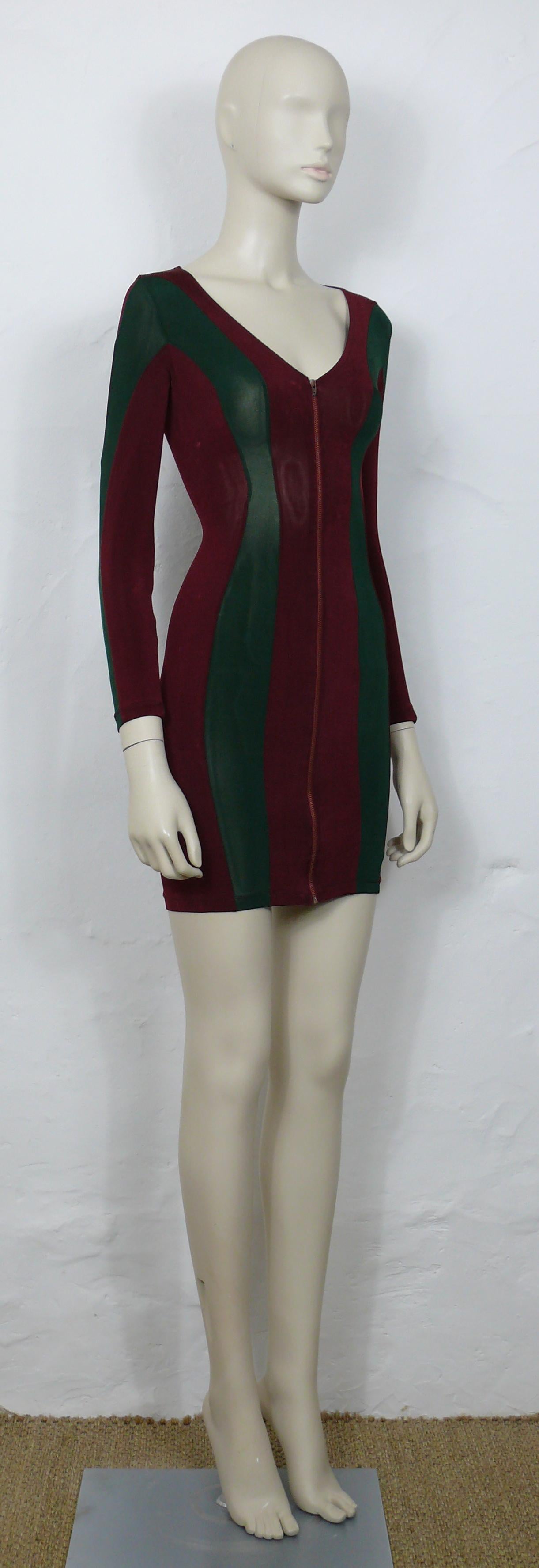 JEAN PAUL GAULTIER  JUNIOR vintage green/burgundy red color block bodycon dress.

Stretchy material.
Front down zippered closure (copper toned hardware).
Long sleeves.
No lining.

Missing brand label.
JUNIOR GAULTIER patch on the back.

Missing size