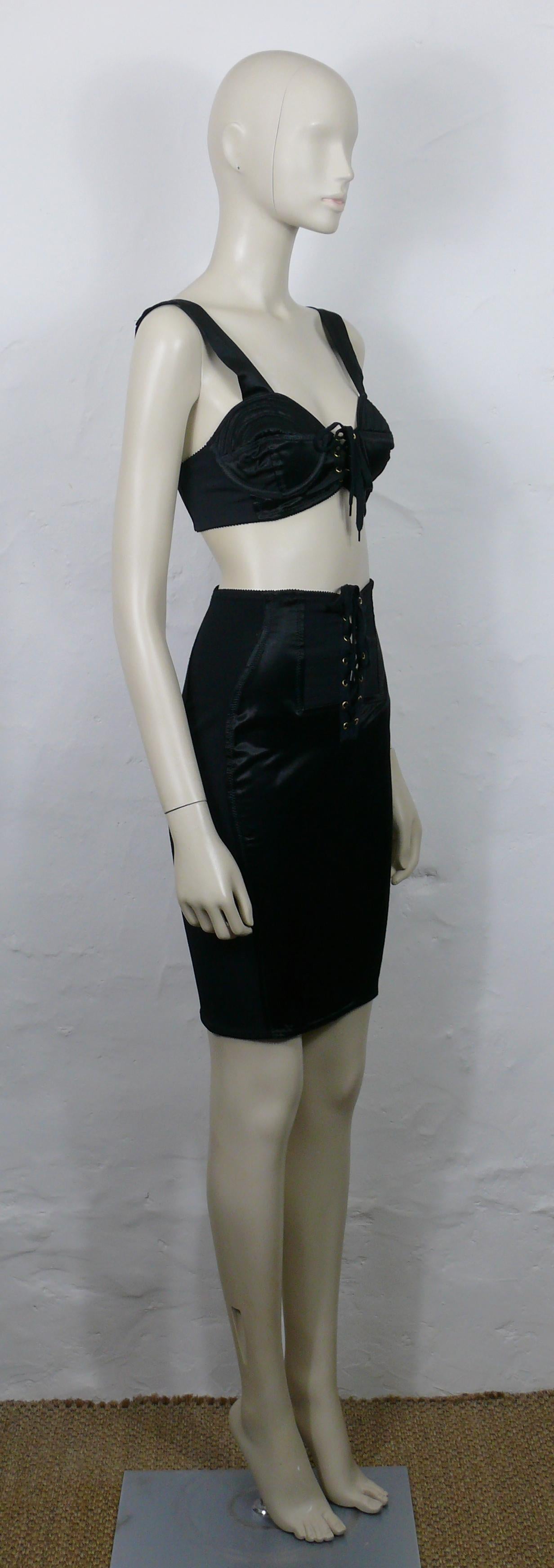 JEAN PAUL GAULTIER JUNIOR vintage rare black cone bra and skirt ensemble.

The BRA features :
- Black satin-like lustre fabric.
- Half cone design on the breast.
- Nylon panels at the sides and back.
- Laced front, gold tone hardware eyelets.
-