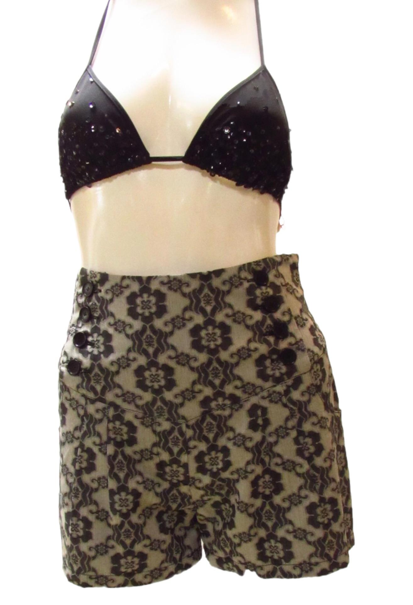 Vintage sailor style shorts from Jean Paul Gaultier feature a fabulous lace-like design, side zip and 