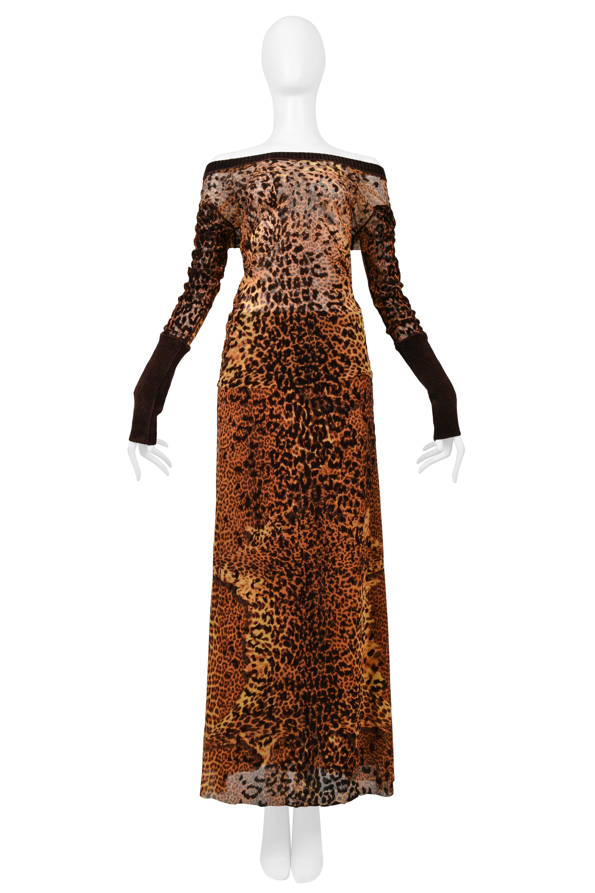 Resurrection is delighted to offer a skirt and top ensemble featuring a transparent mesh leopard print fabric with velvet textured detailing. Top features a stretchy fitted shape, dramatic sleeve length with ribbed velvet forearms, ribbed velvet