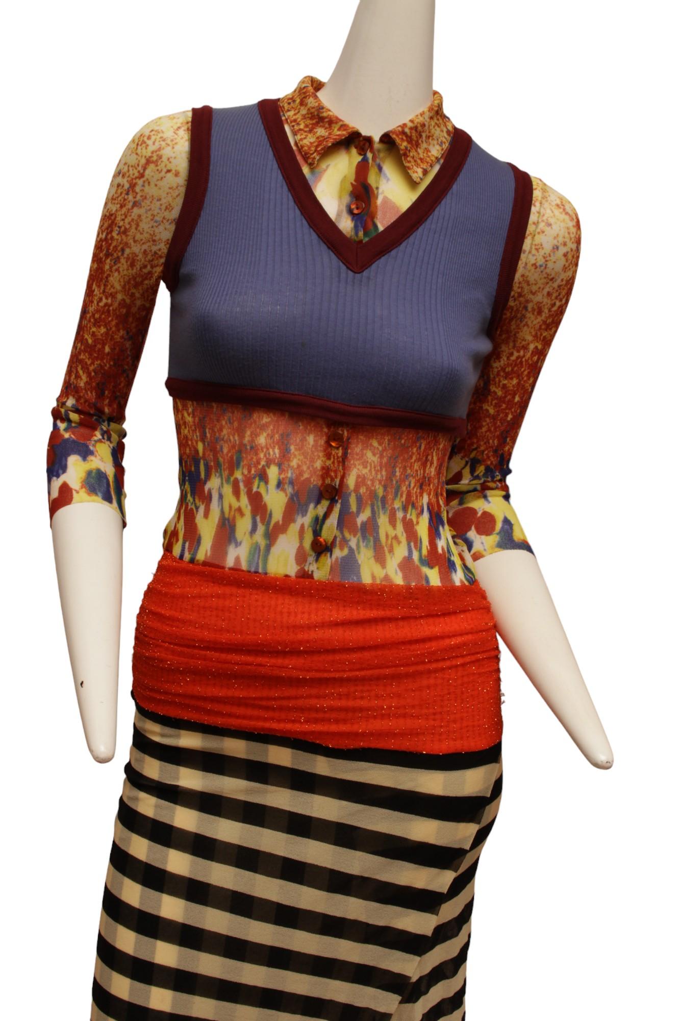 JEAN PAUL GAULTIER, Maille, 1997 S/S, Optical illusion dress with v-neck, long sleeves and banded waist. 

Dress has multicolor 3/4 sleeves and top with a jersey vest overlay, orange and tinsel band, skirt bottom is black and white