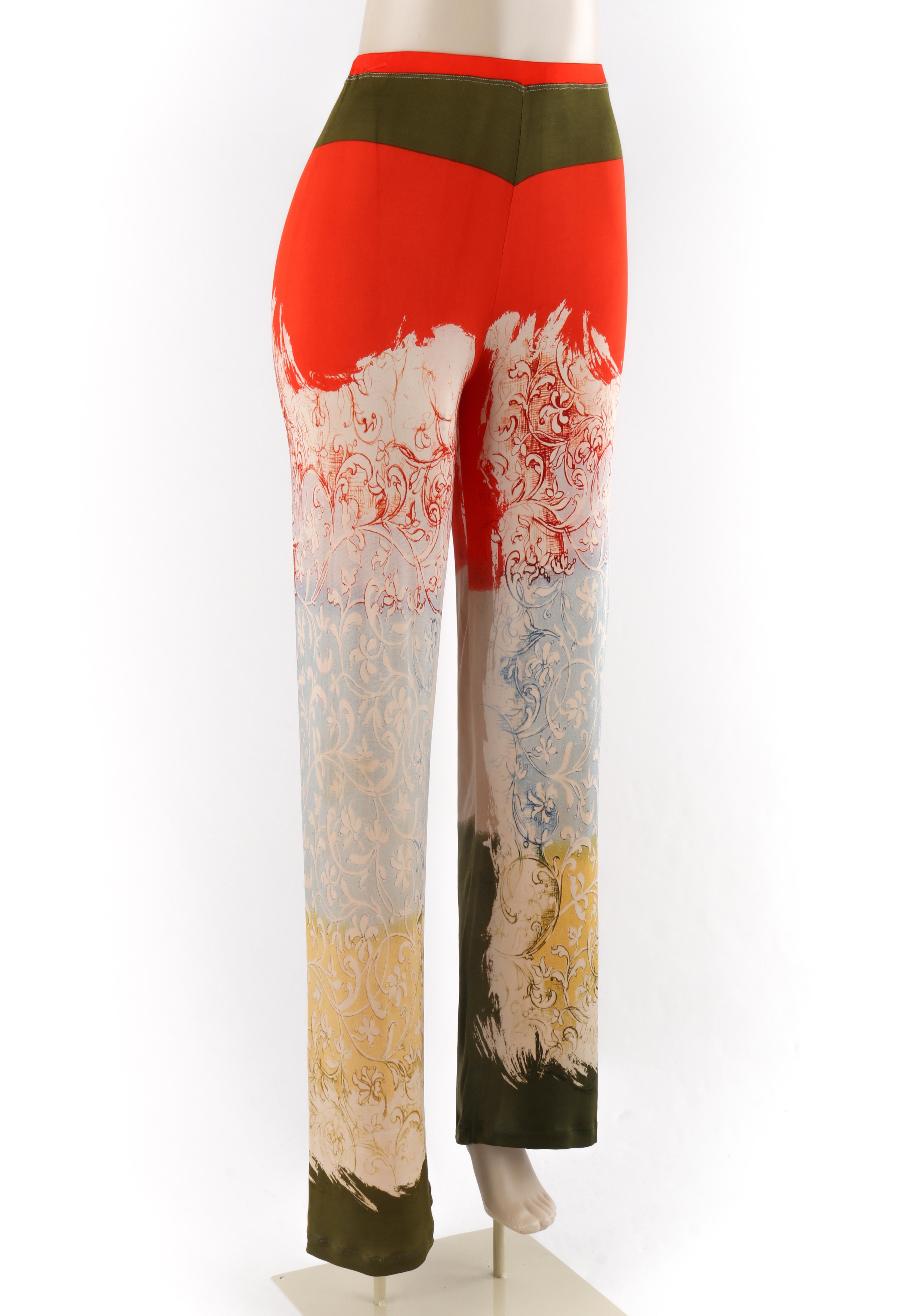 JEAN PAUL GAULTIER Maille c.1990’s Multicolor White Floral Print Straight Leg Pants
Circa: c.1990’s 
Label(s): Jean-Paul Gaultier Maille
Designer: Jean Paul Gaultier
Style: Wide leg pants
Color(s): Shades of orange, blue, green, yellow, gray, and